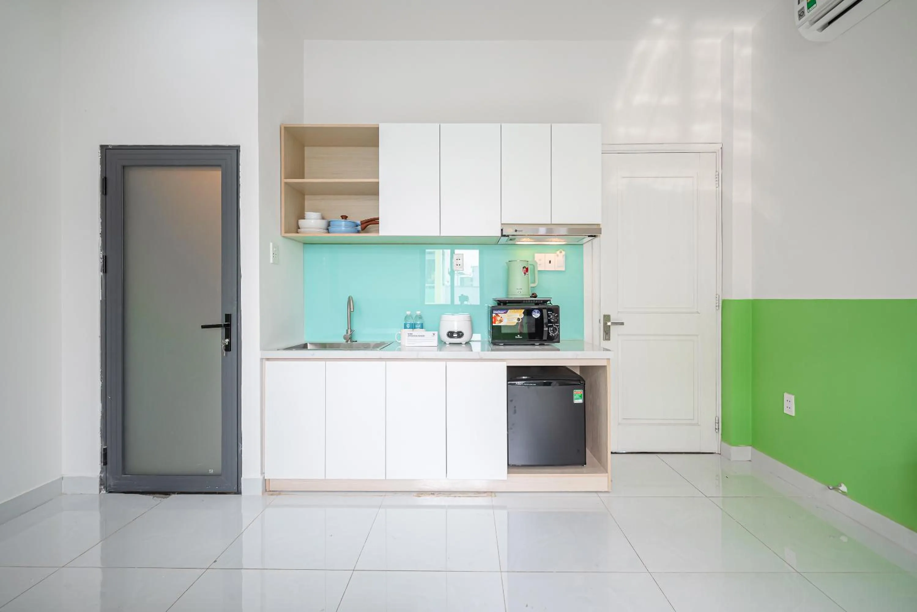 Kitchen or kitchenette in Cozrum Homes - Coraline House