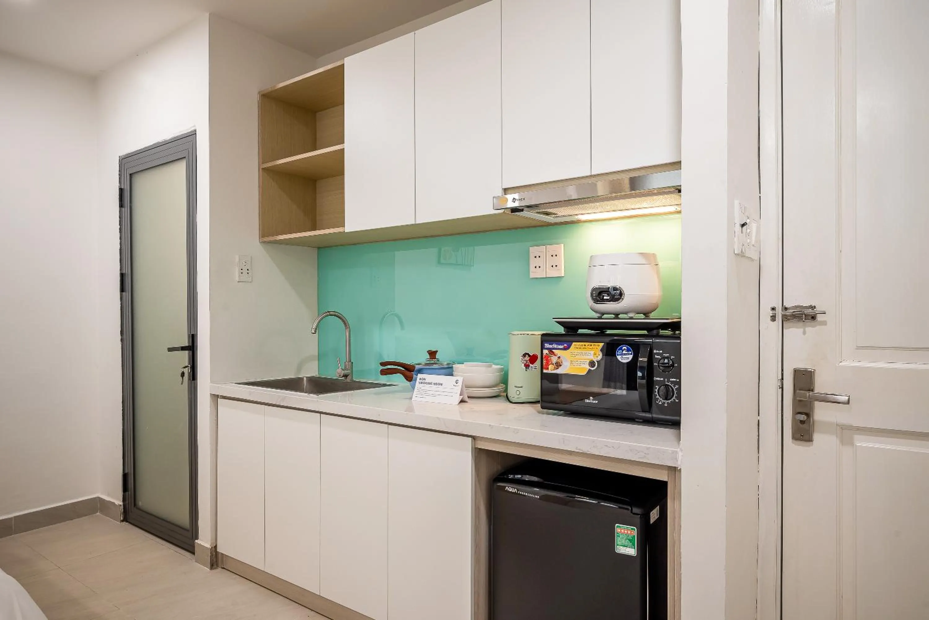 Kitchen or kitchenette in Cozrum Homes - Coraline House