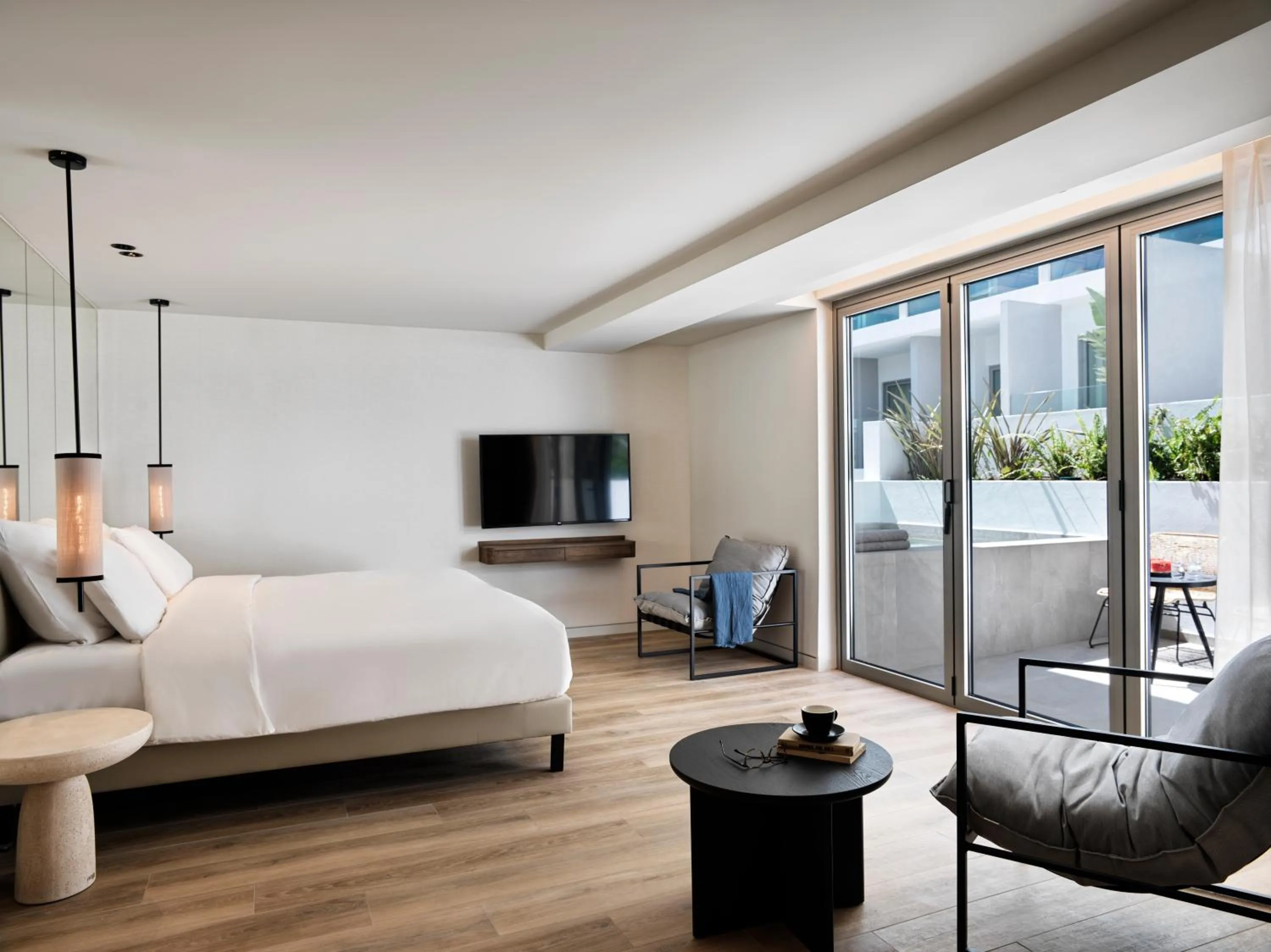 Photo of the whole room, Bed in NIKO Seaside Resort MGallery