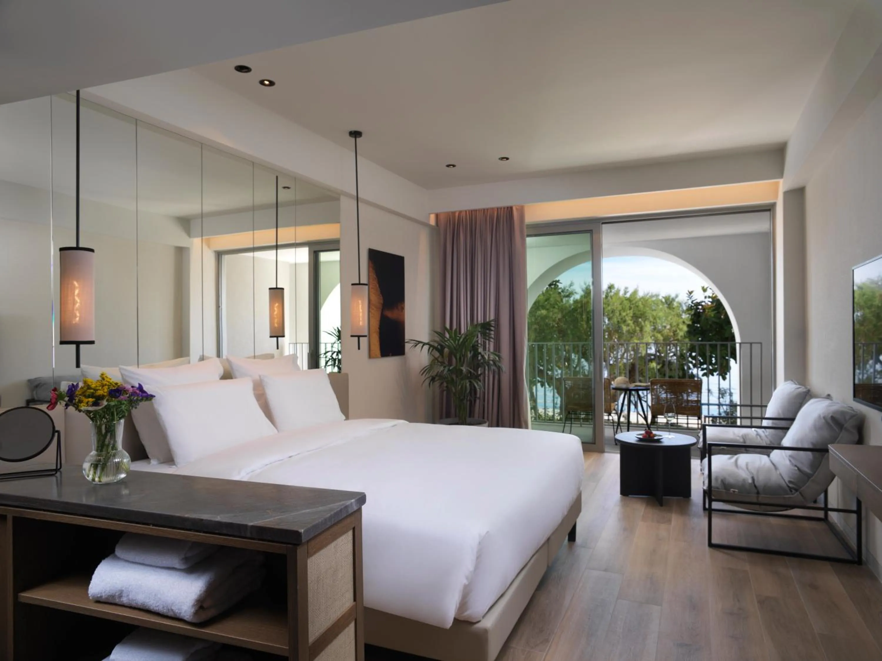 Photo of the whole room, Bed in NIKO Seaside Resort MGallery