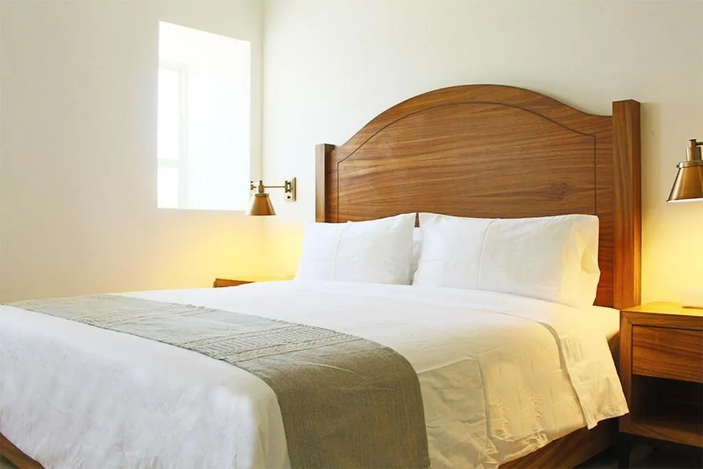 Bed in Casa Maria Boutique Hotel