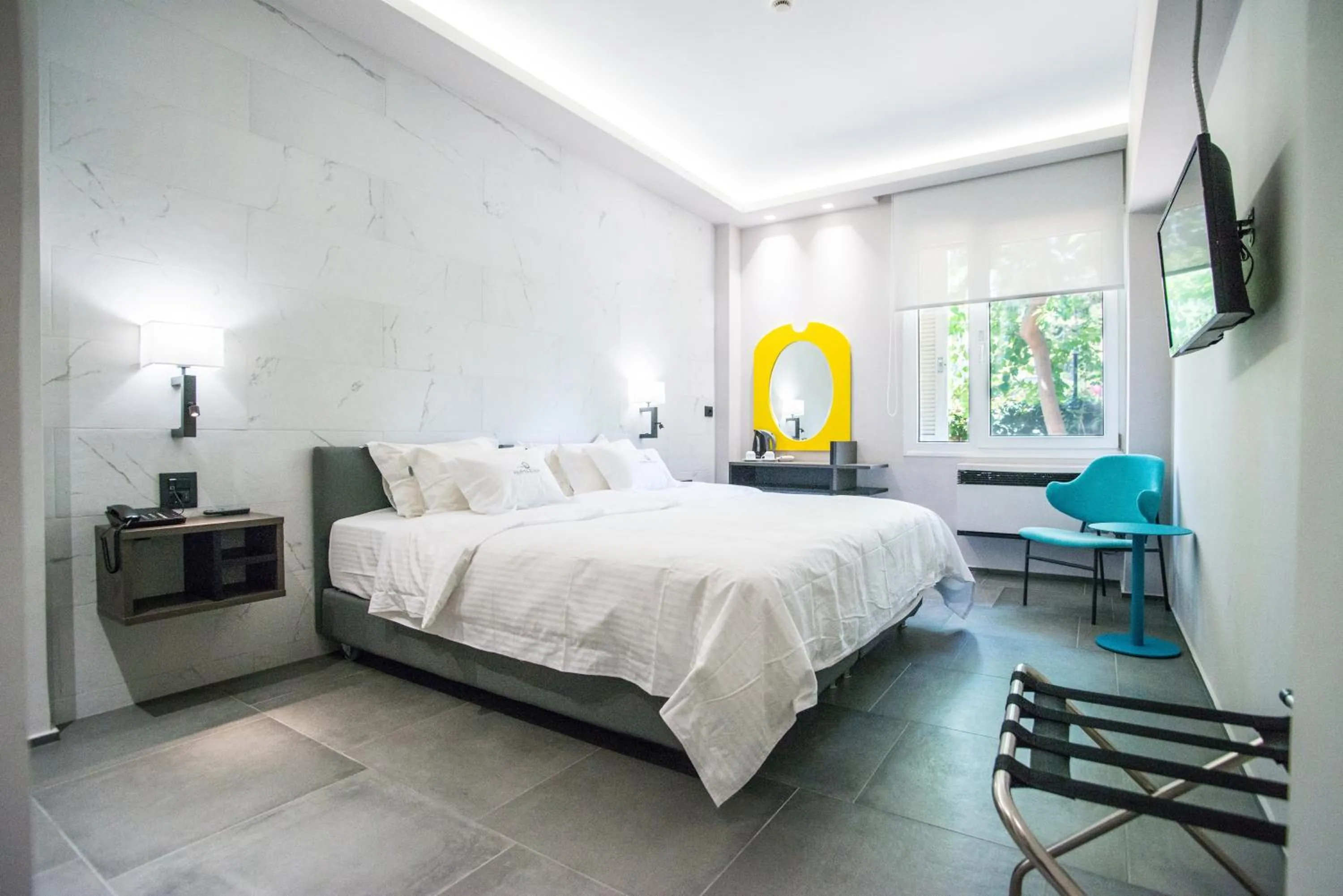 Bed in Palmyra Beach Hotel