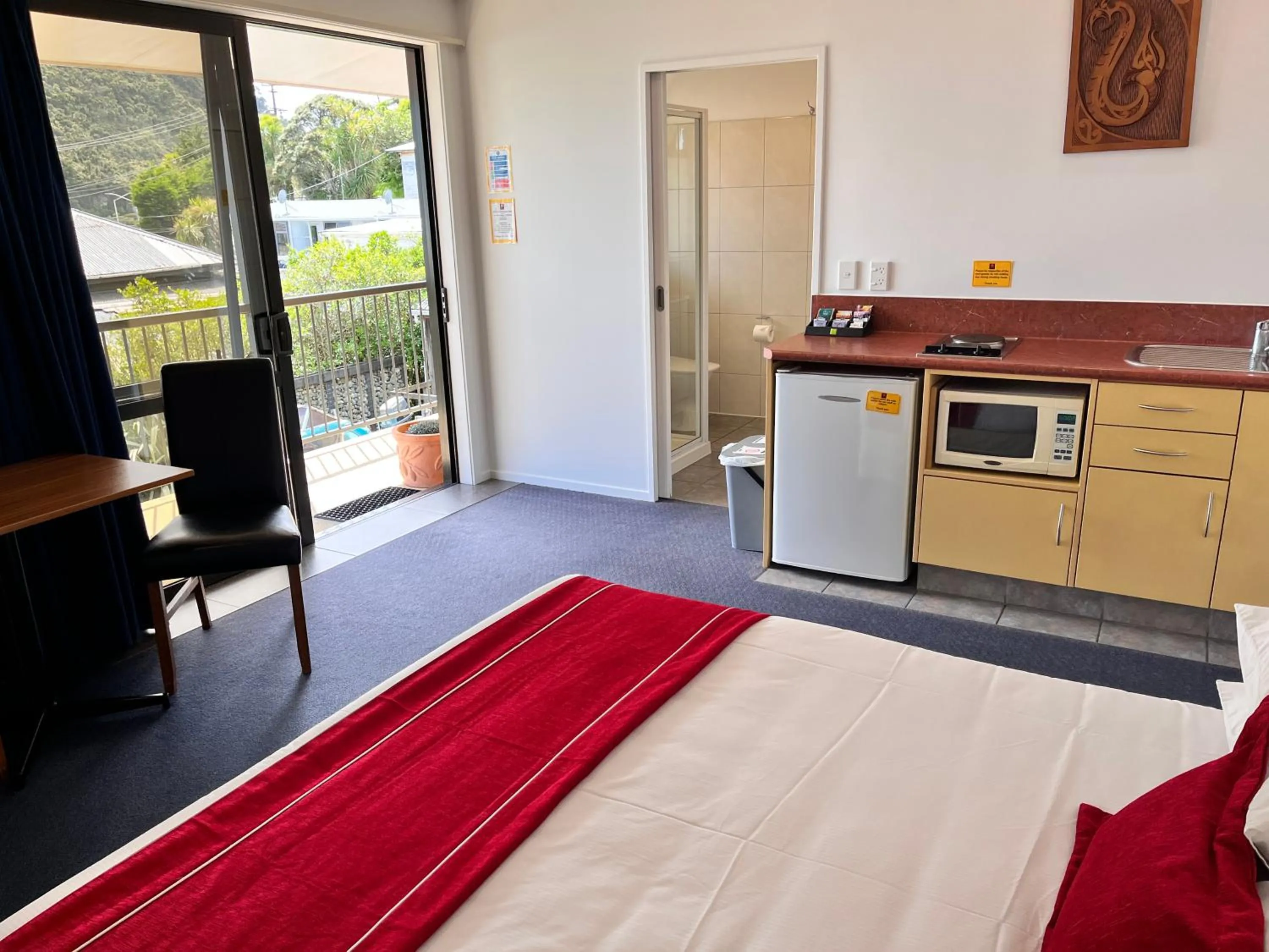 Bed in Sundowner Motel