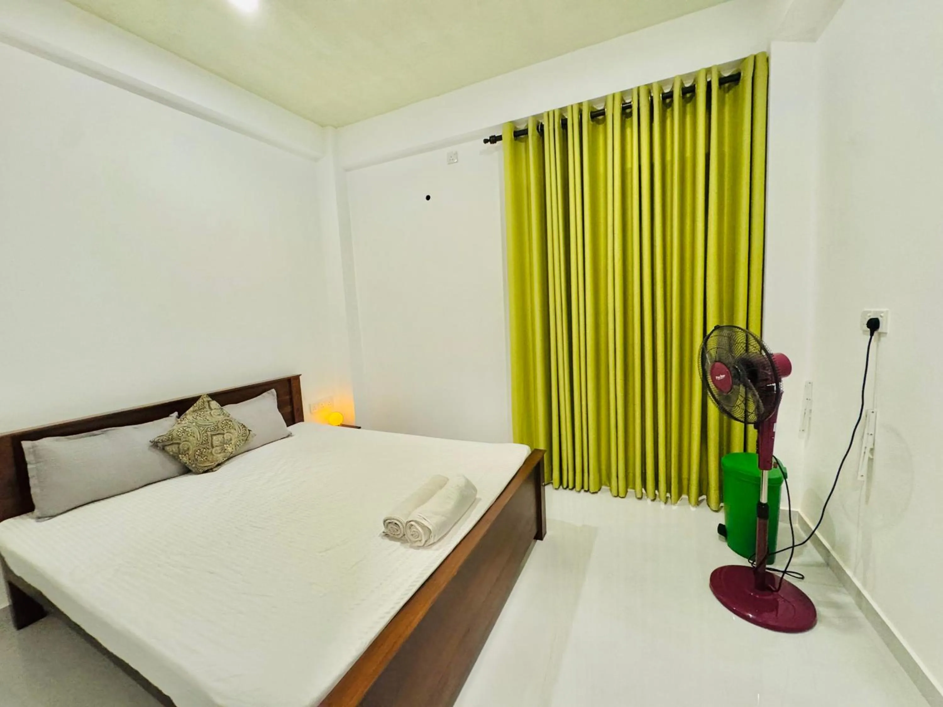 Bed in Sea Breeze Guest House Negombo