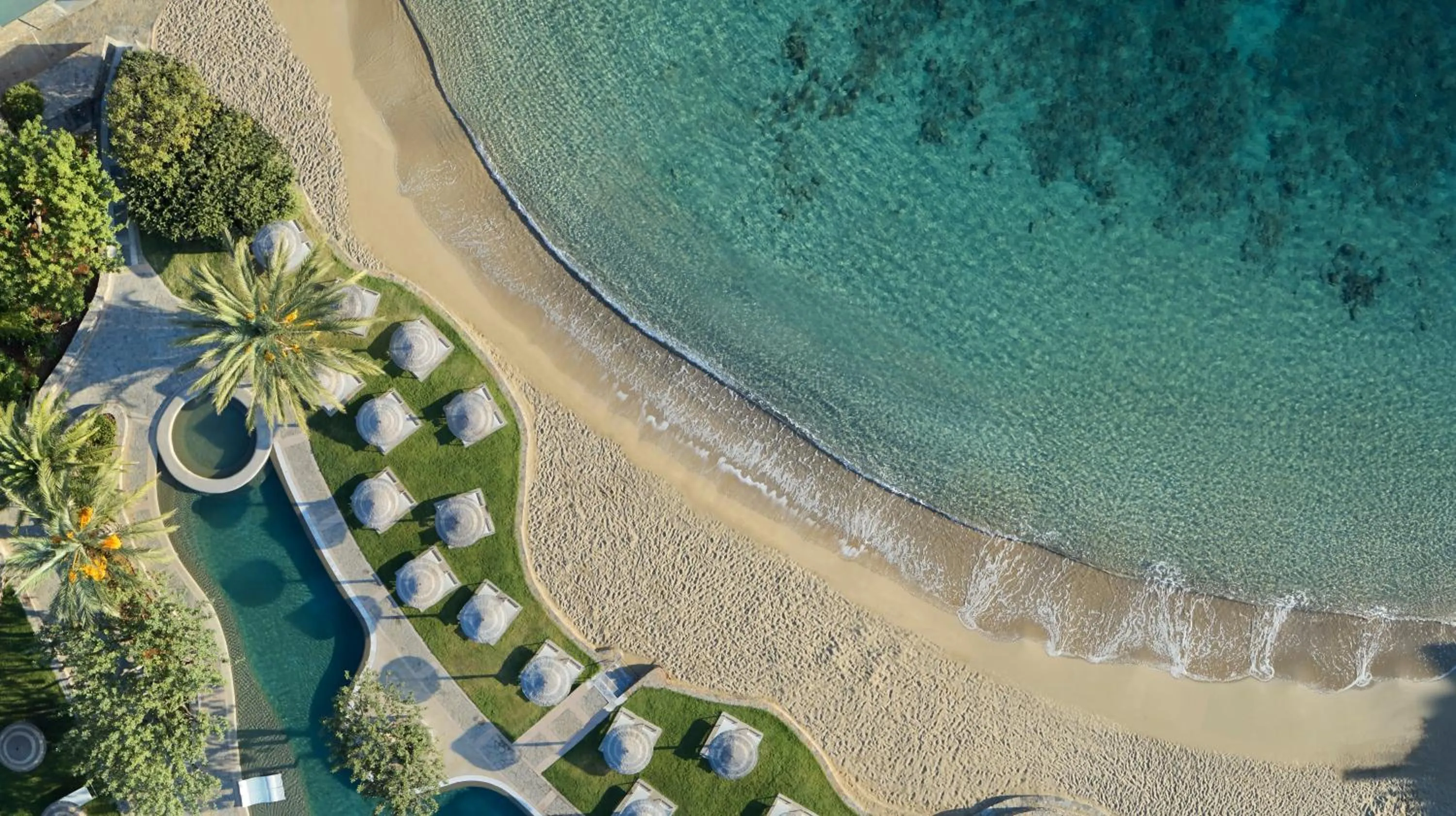Beach in Elounda Peninsula Luxury Resort, Six Senses Spa