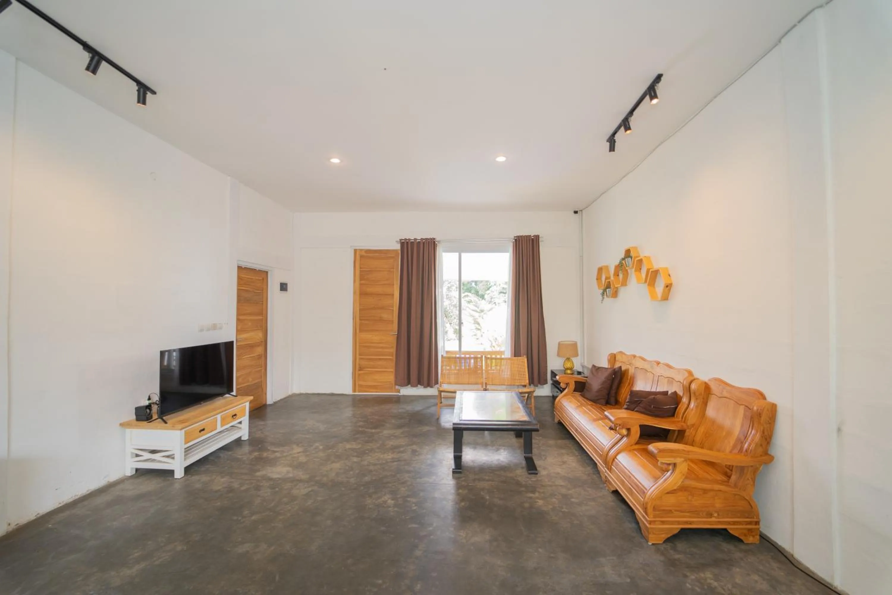 Communal lounge/ TV room in Villa Sawah Prambanan