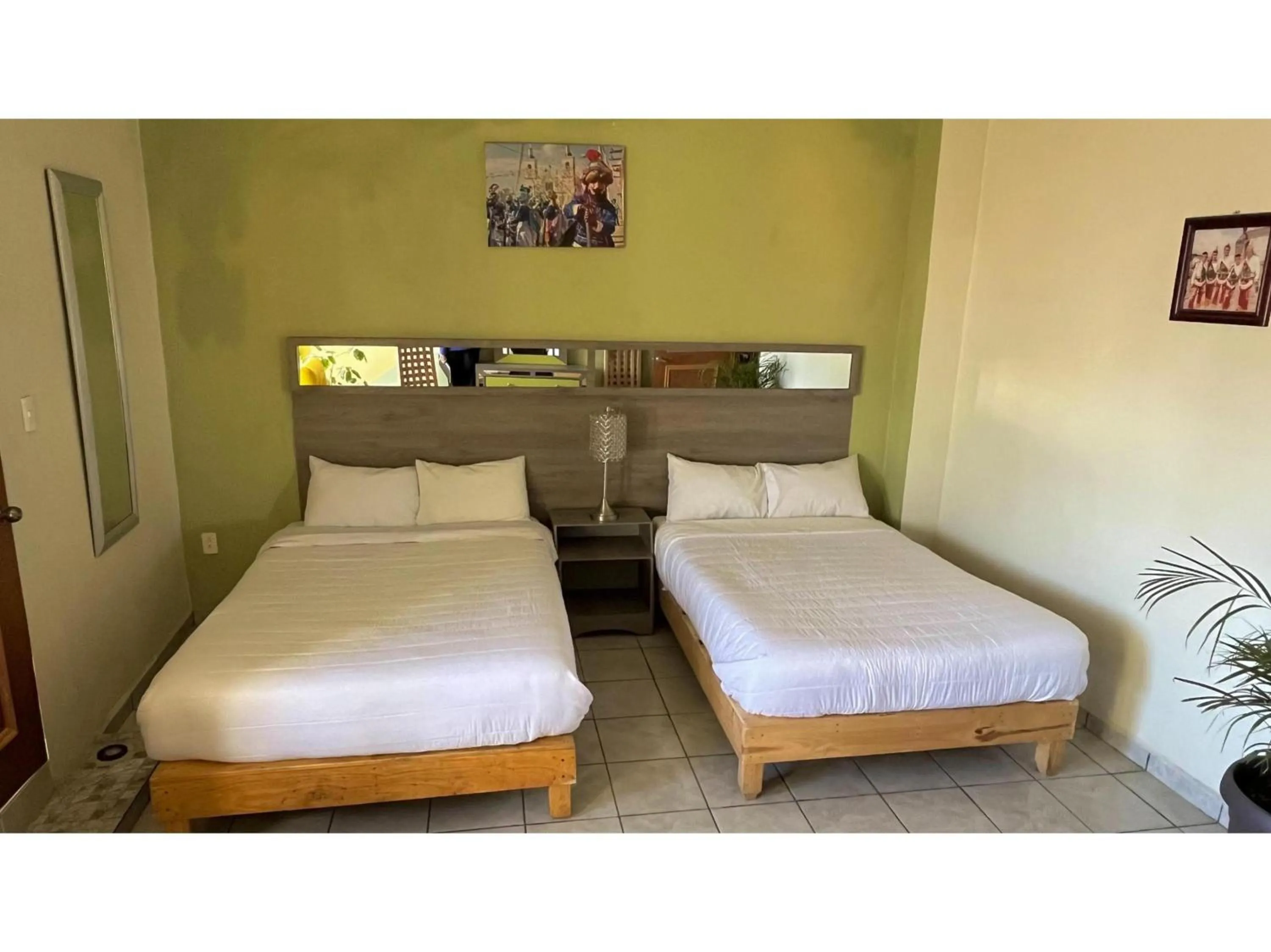 Bedroom, Bed in OYO Hotel Museo Carnaval