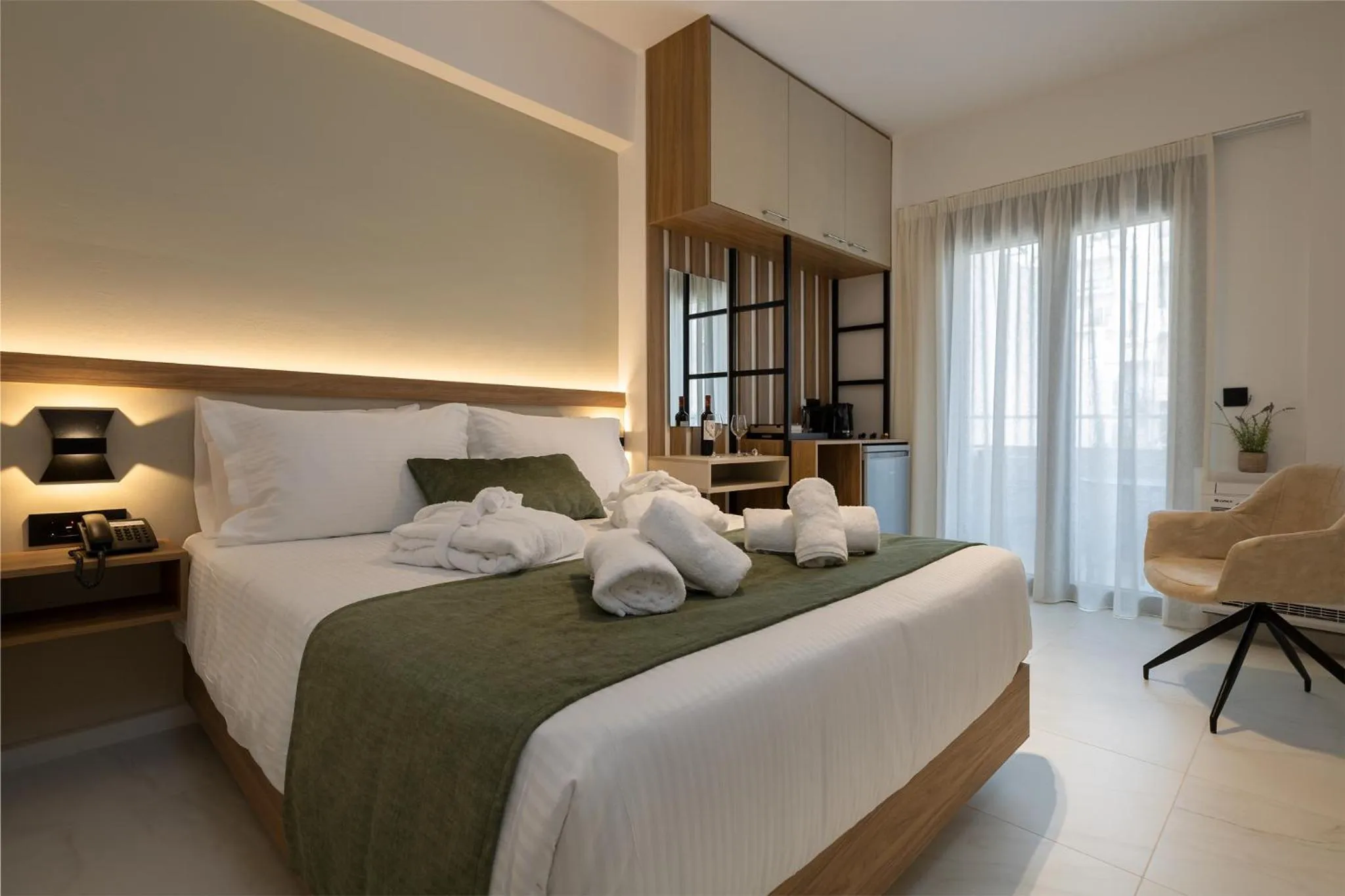 Bed in Ruby Luxury Suites