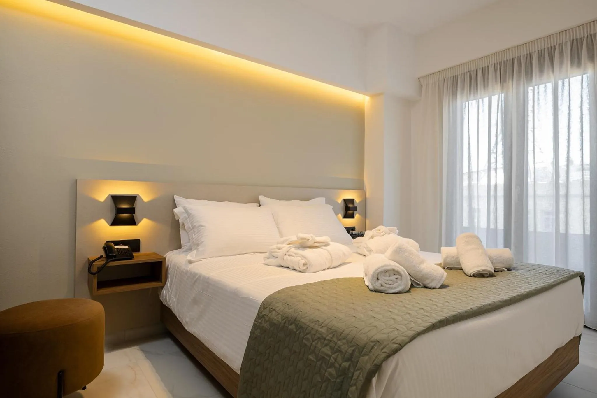 Bed in Ruby Luxury Suites