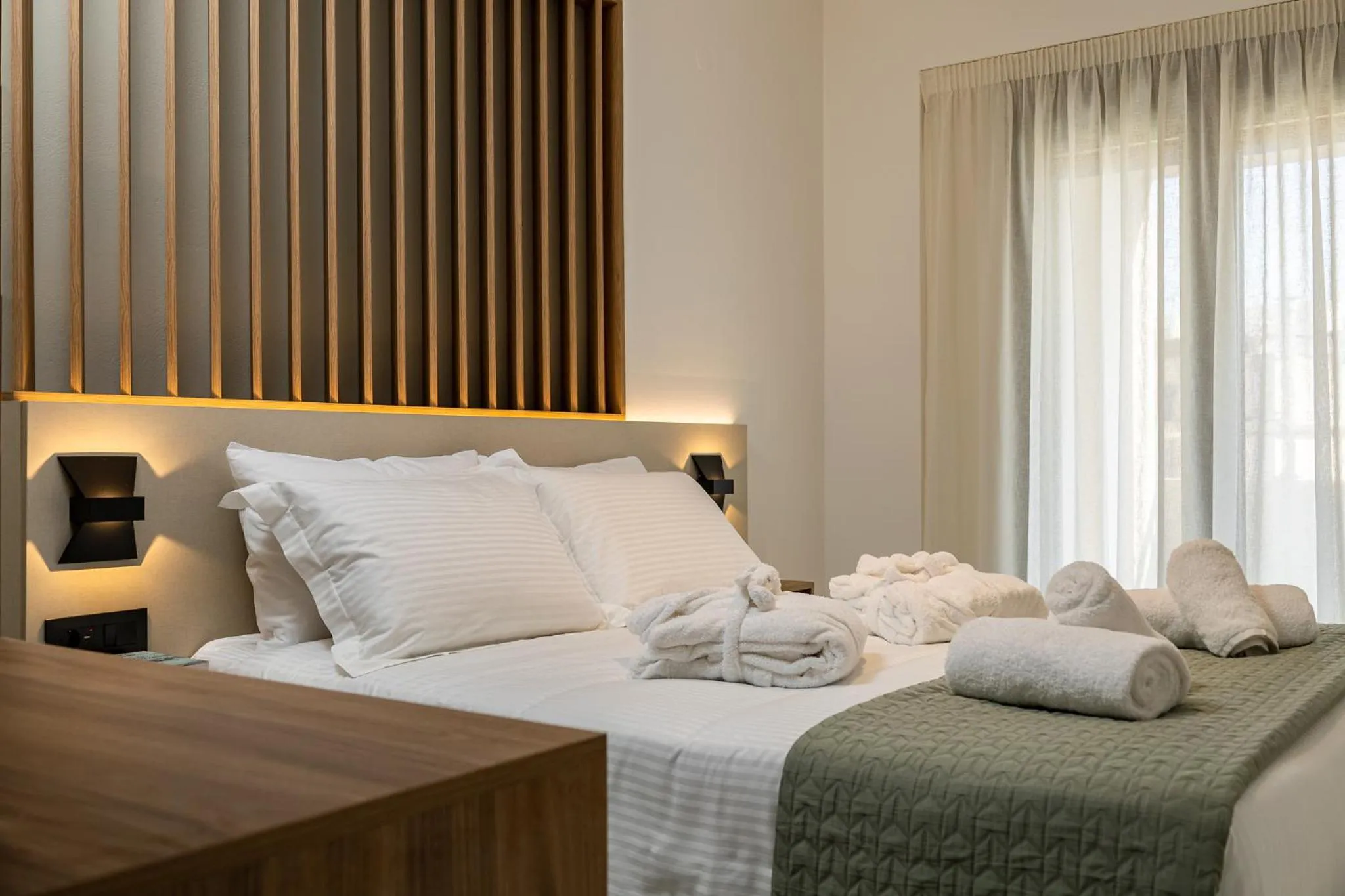 Bed in Ruby Luxury Suites