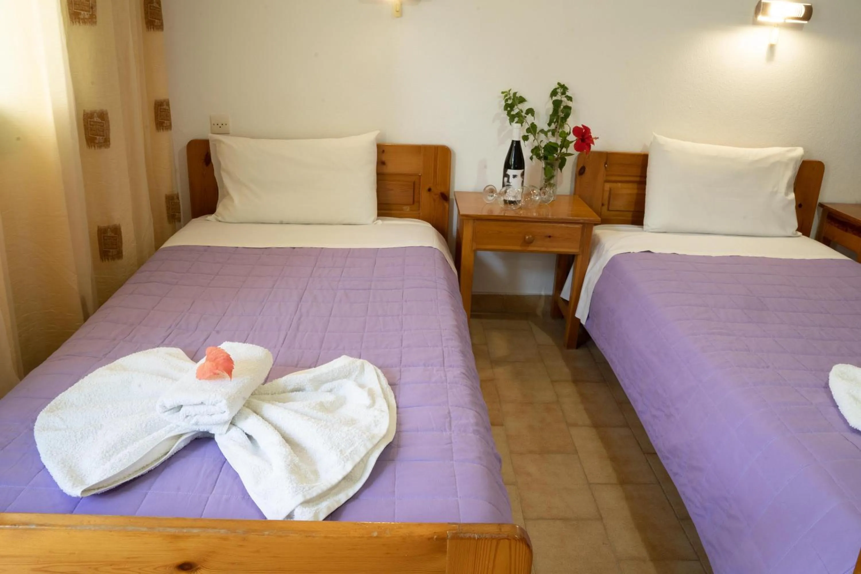 Bed in Dimitris Villa Hotel