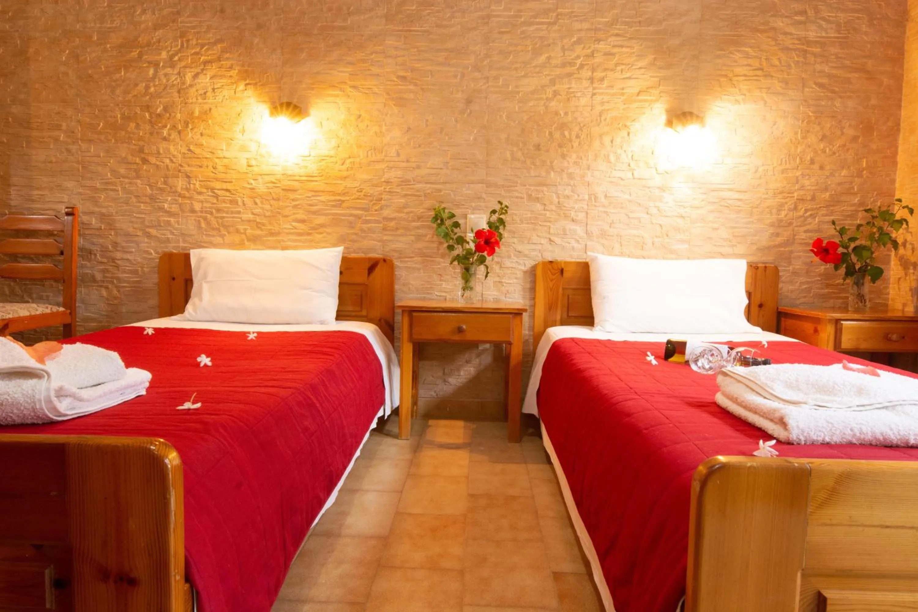 Bed in Dimitris Villa Hotel