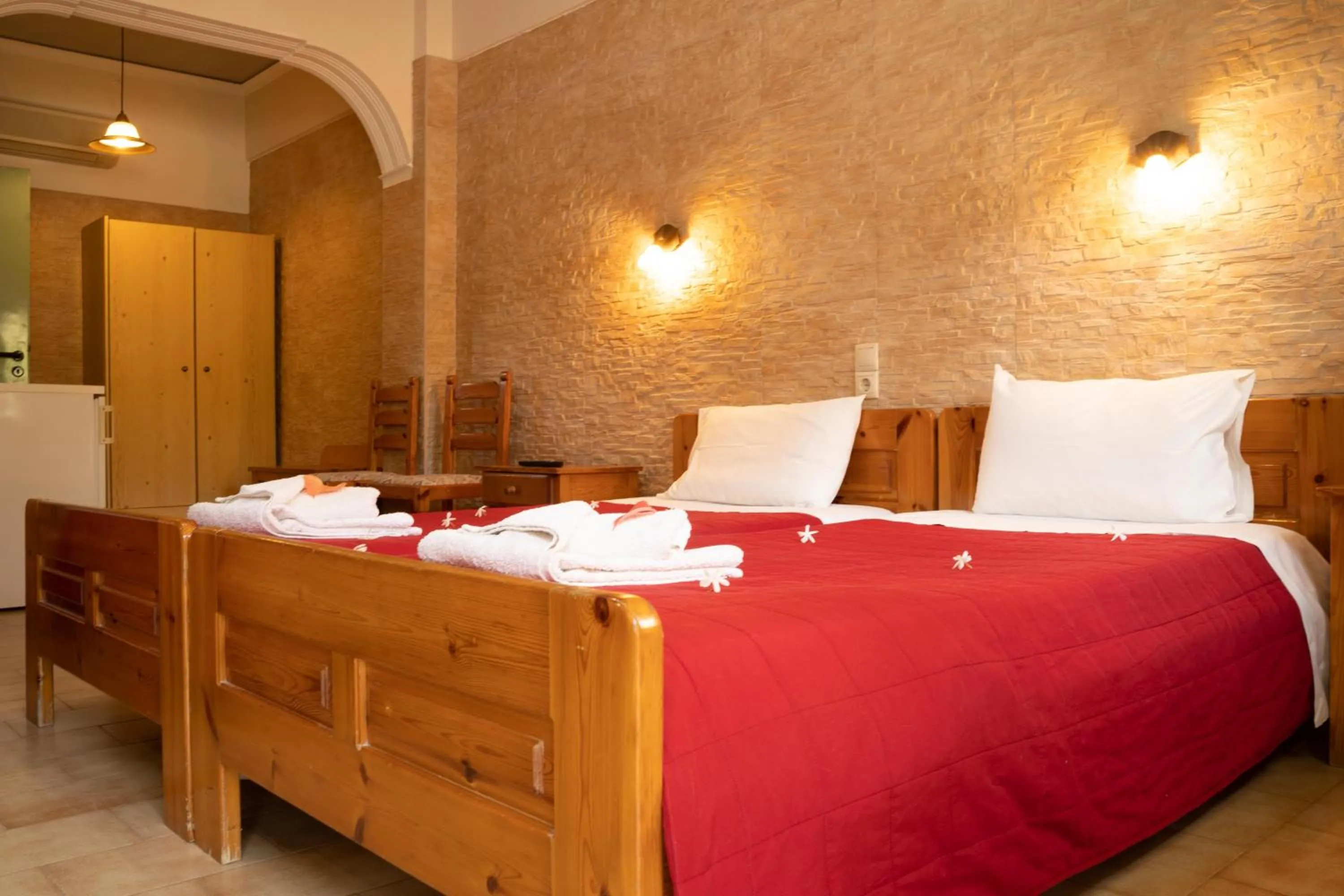 Bed in Dimitris Villa Hotel