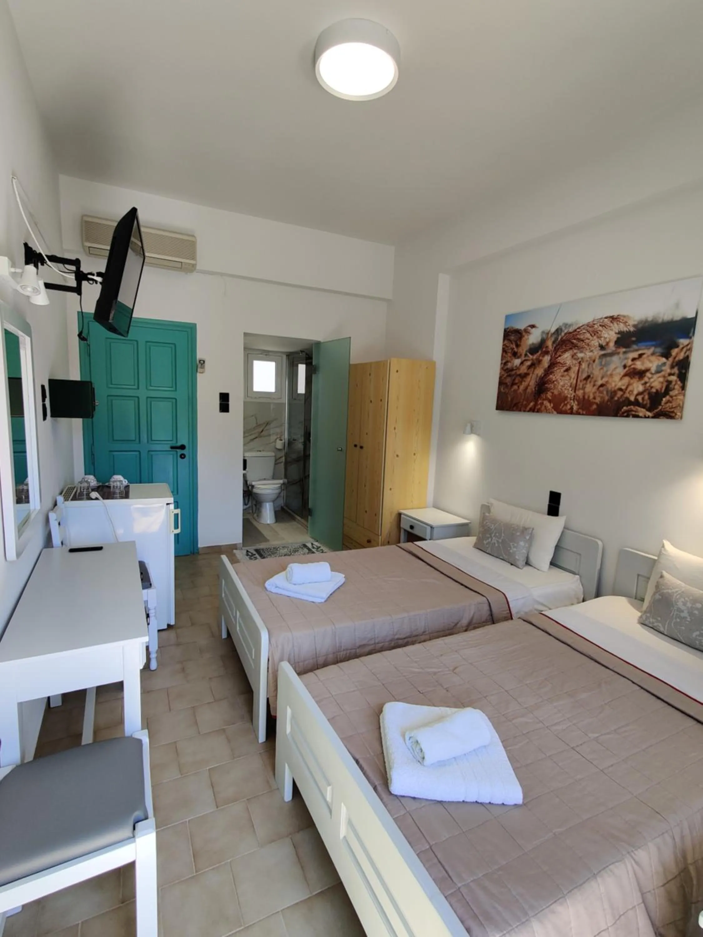 Bed in Dimitris Villa Hotel