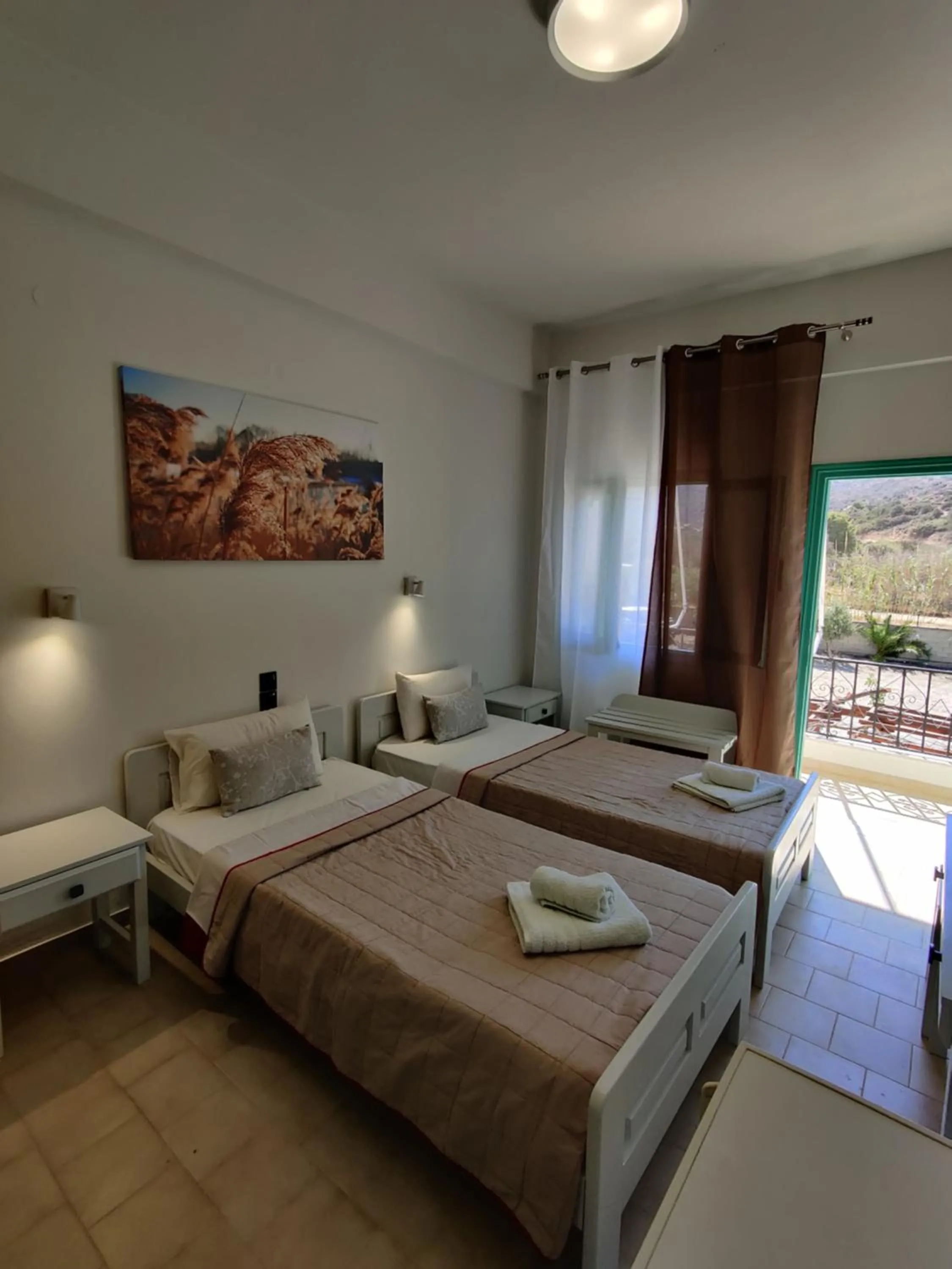 Bed in Dimitris Villa Hotel