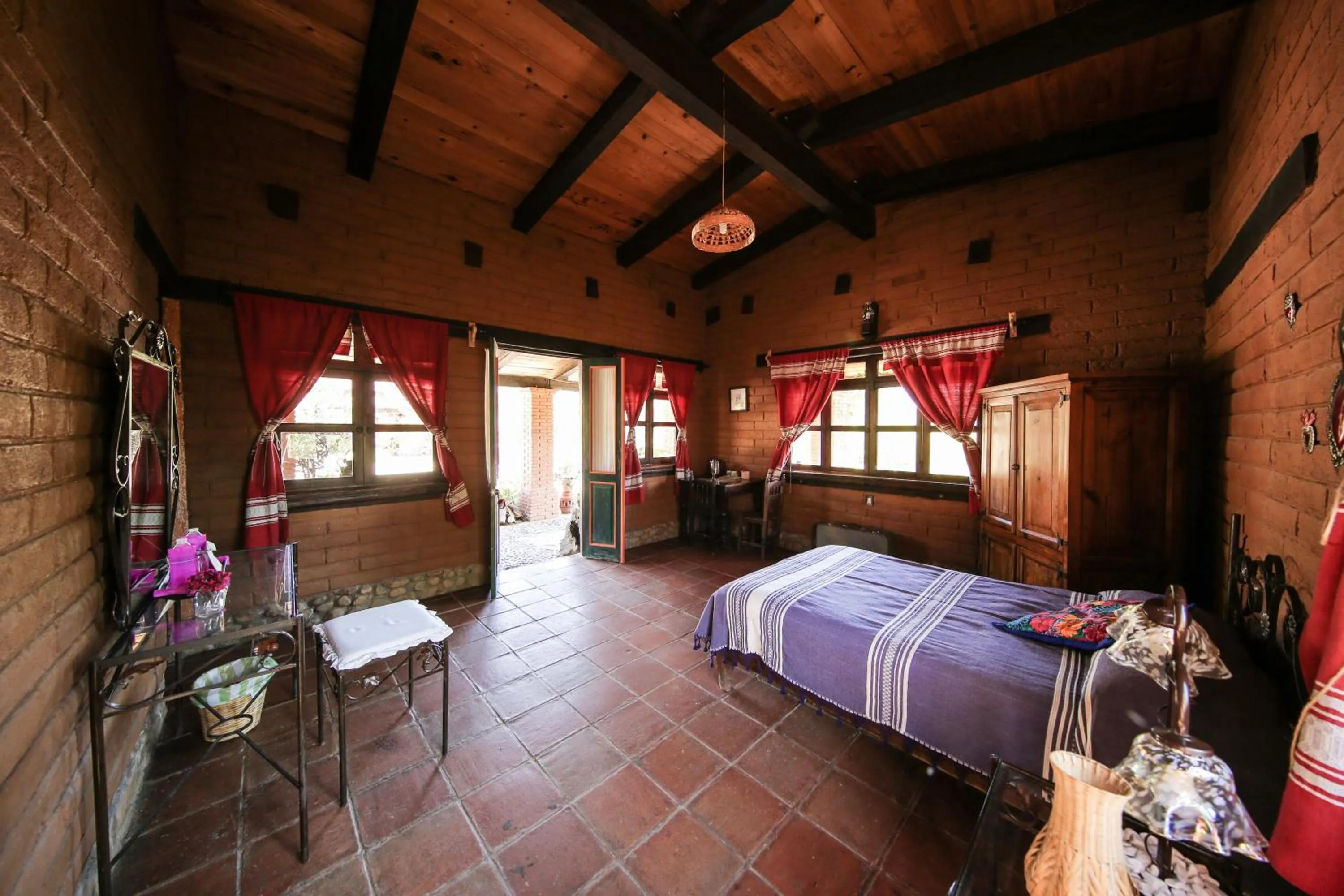 Bed in Huayápam Yù'ú Lodge