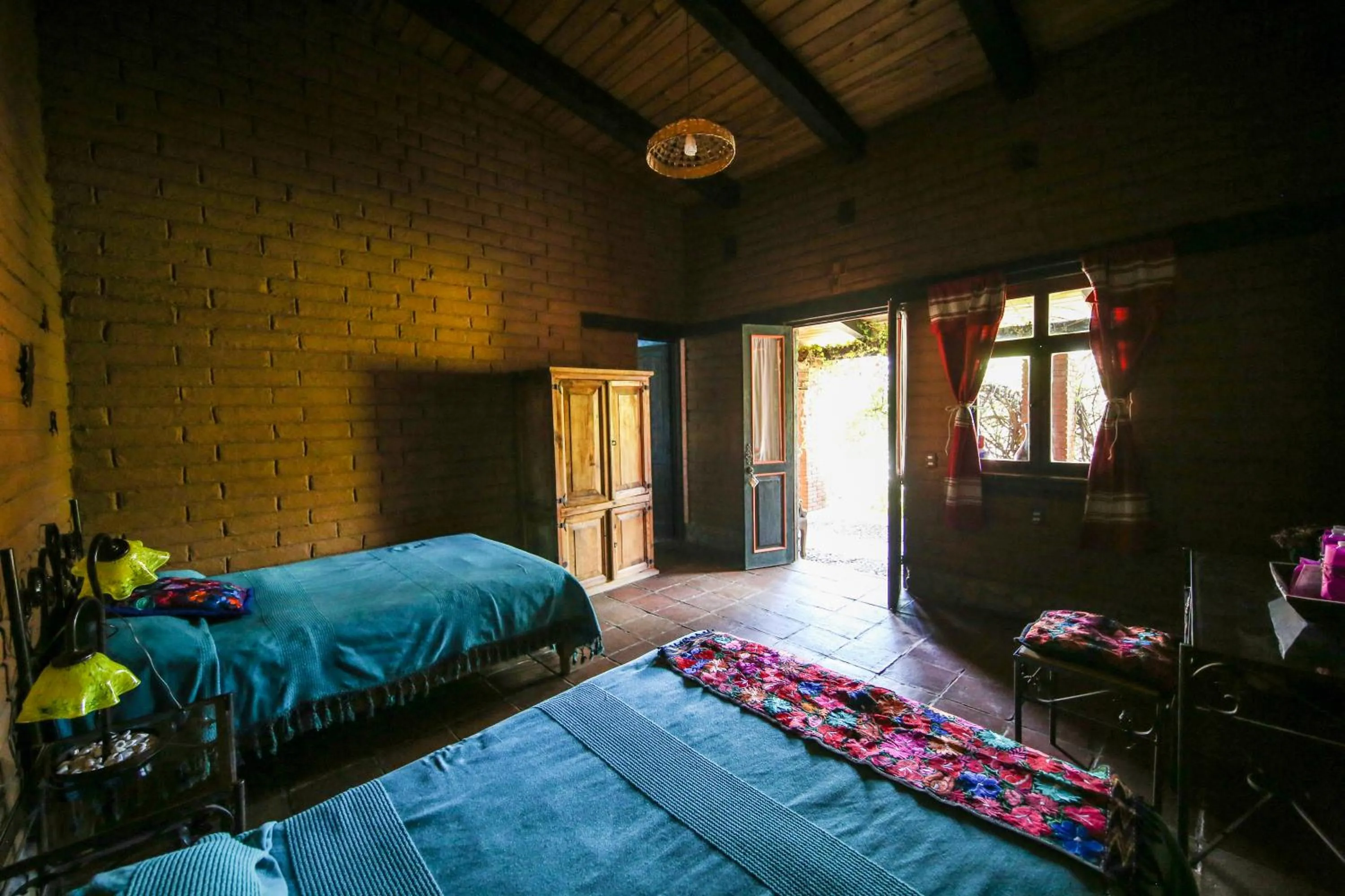 Bed in Huayápam Yù'ú Lodge