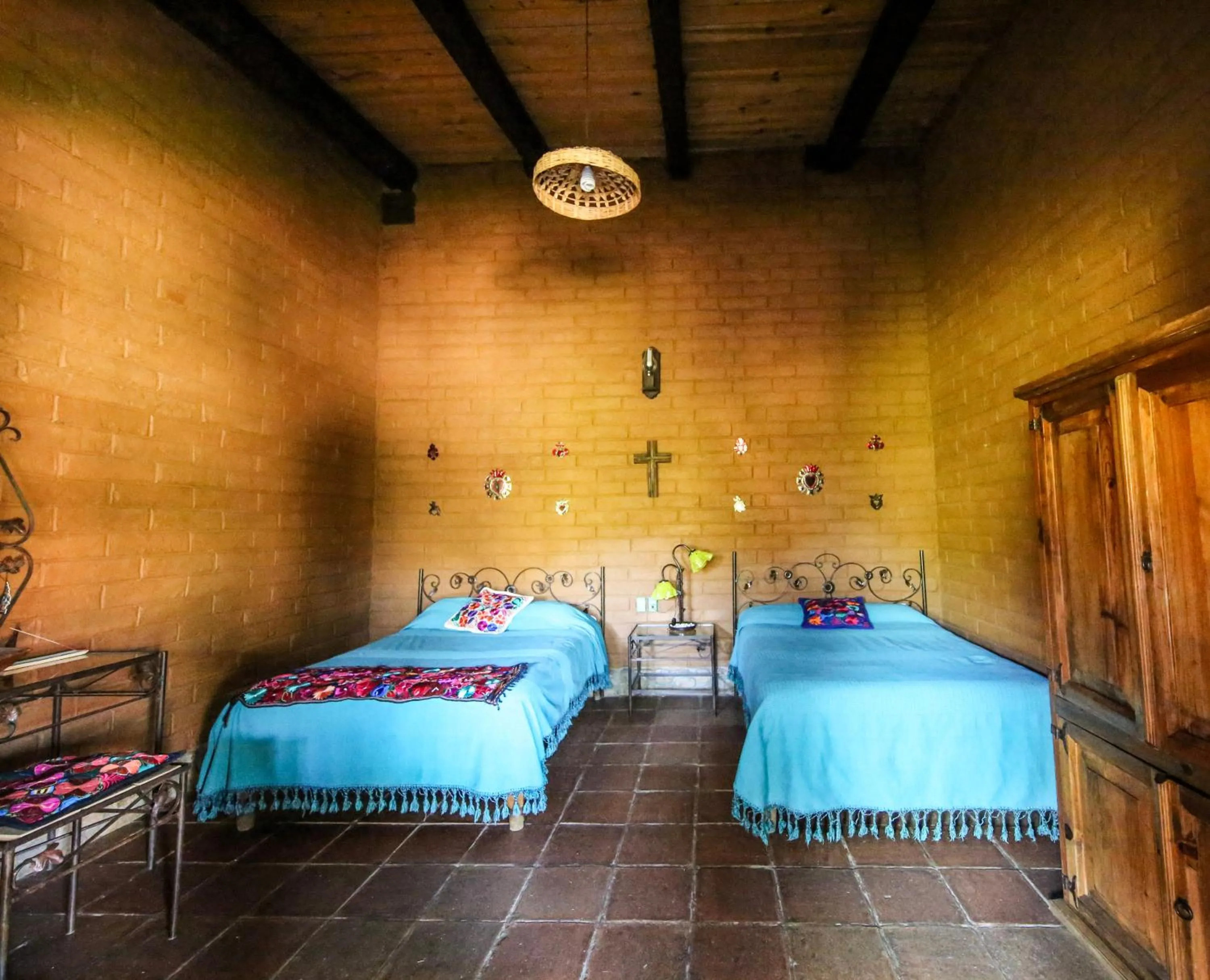 Bed in Huayápam Yù'ú Lodge