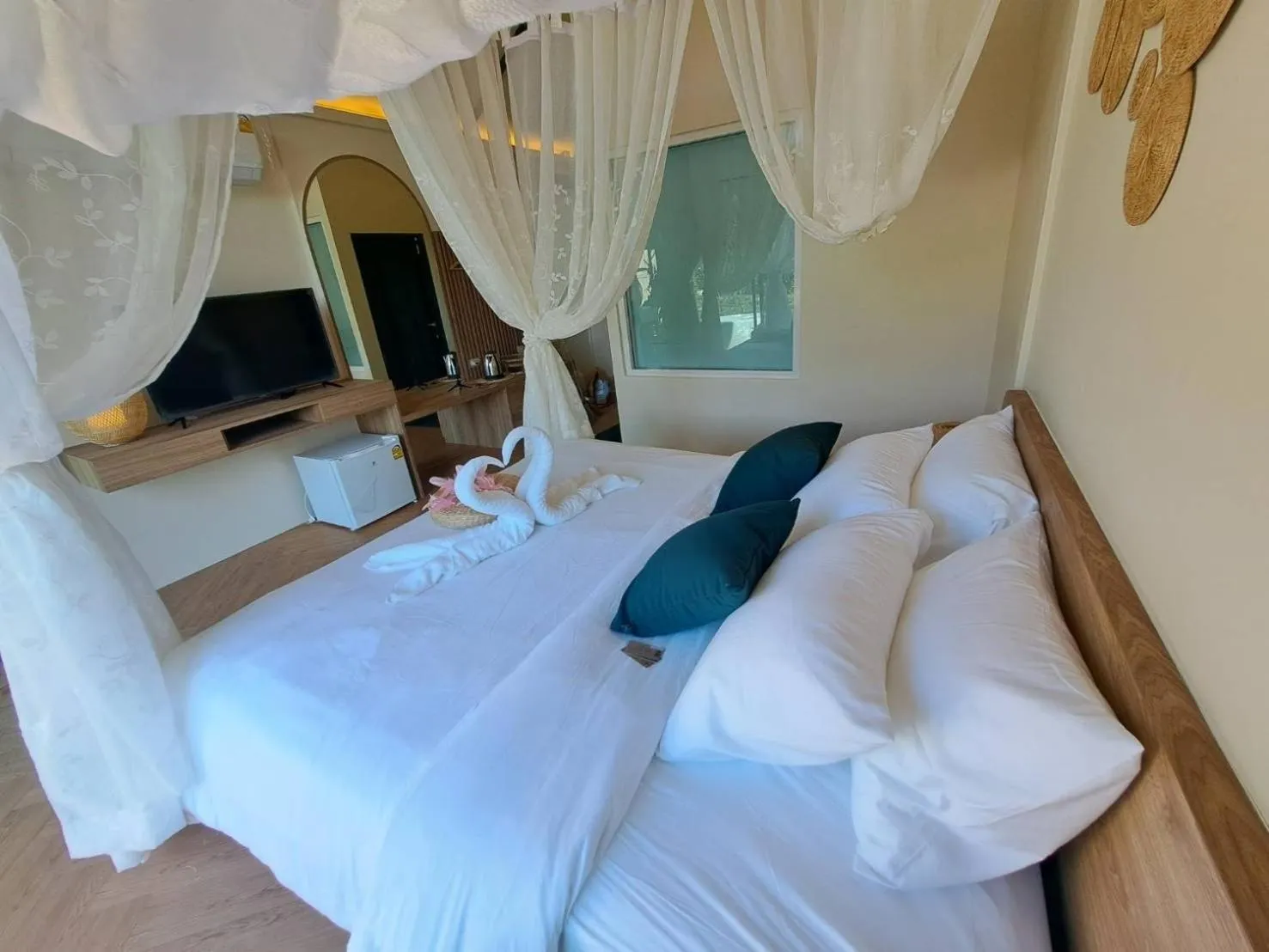 Bed in Baan Nai Baan Nok Resort