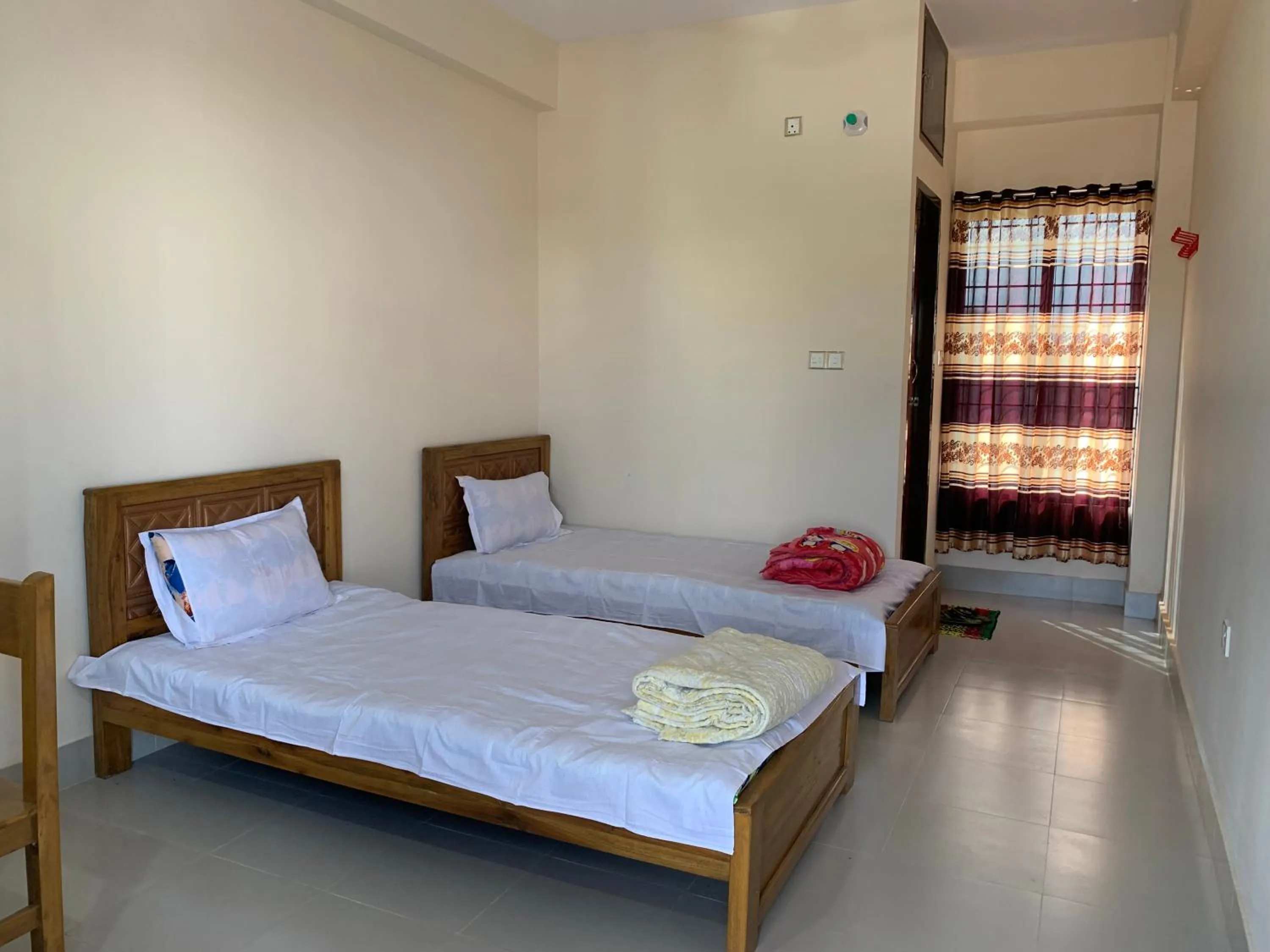 Bed in Hotel Grand Brothers