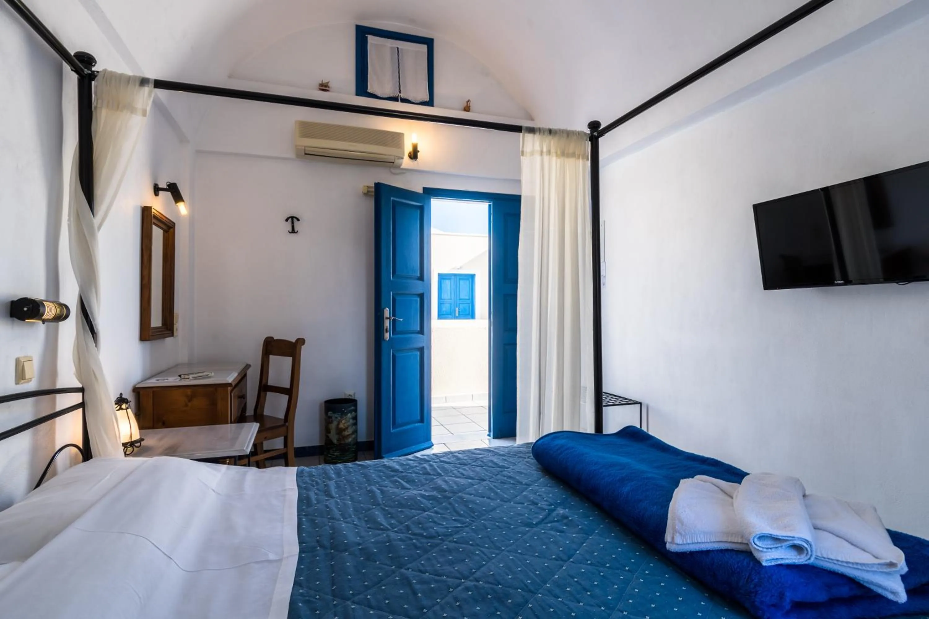 Bed in Irigeneia Hotel