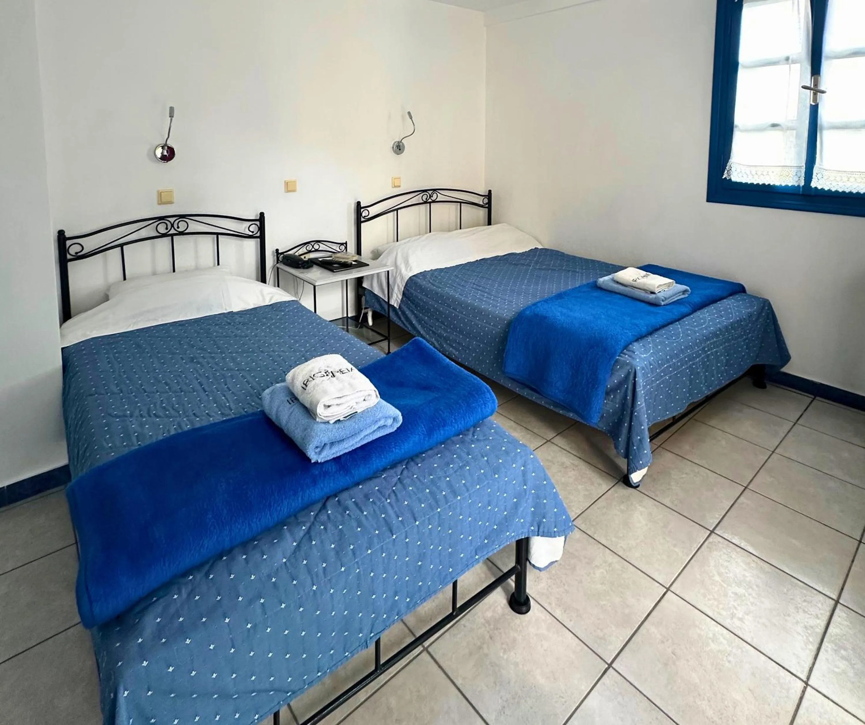 Bed in Irigeneia Hotel