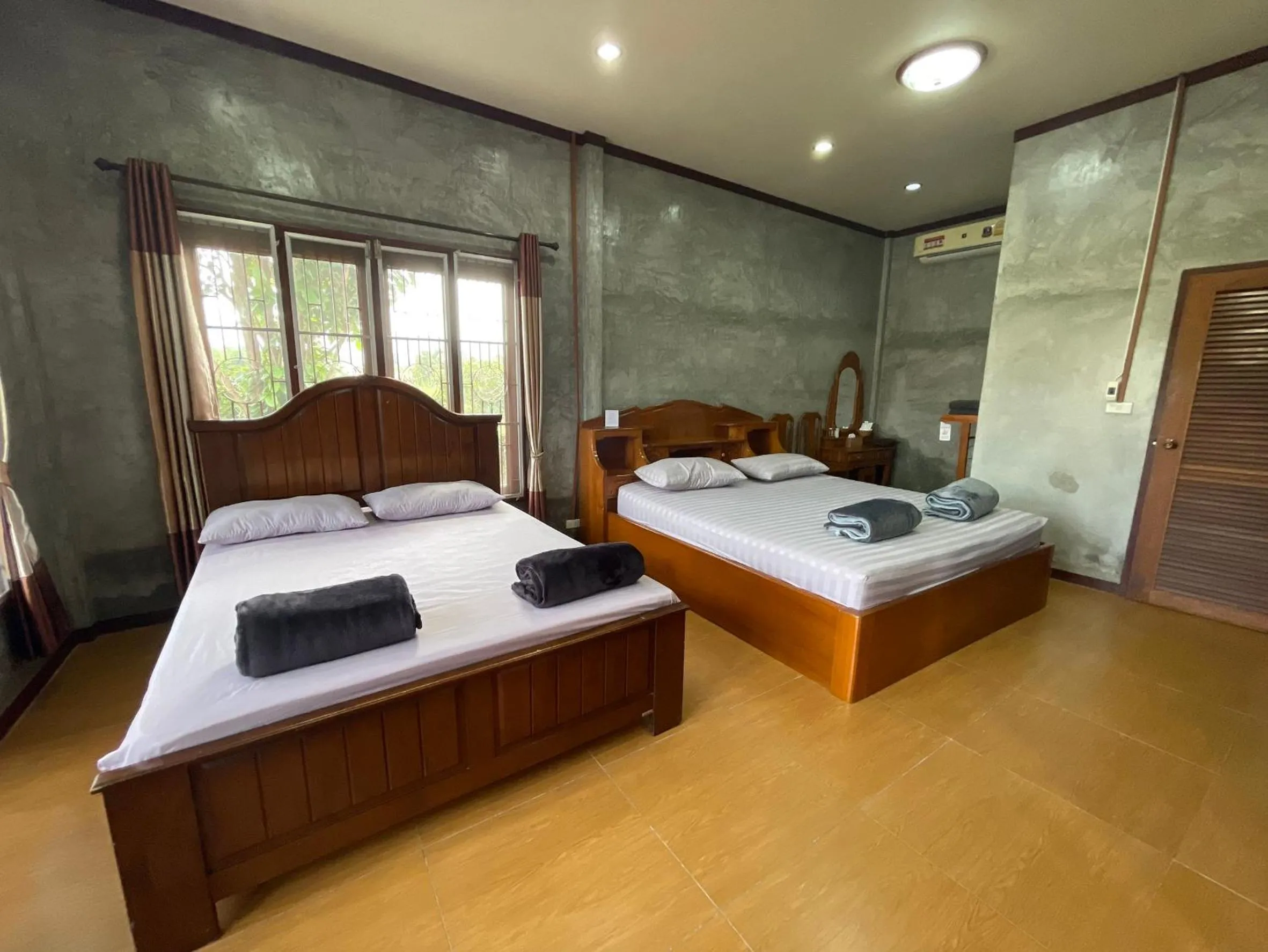 Bed in Yaowarate Sport Club and Resort ไร่เยาวเรศ