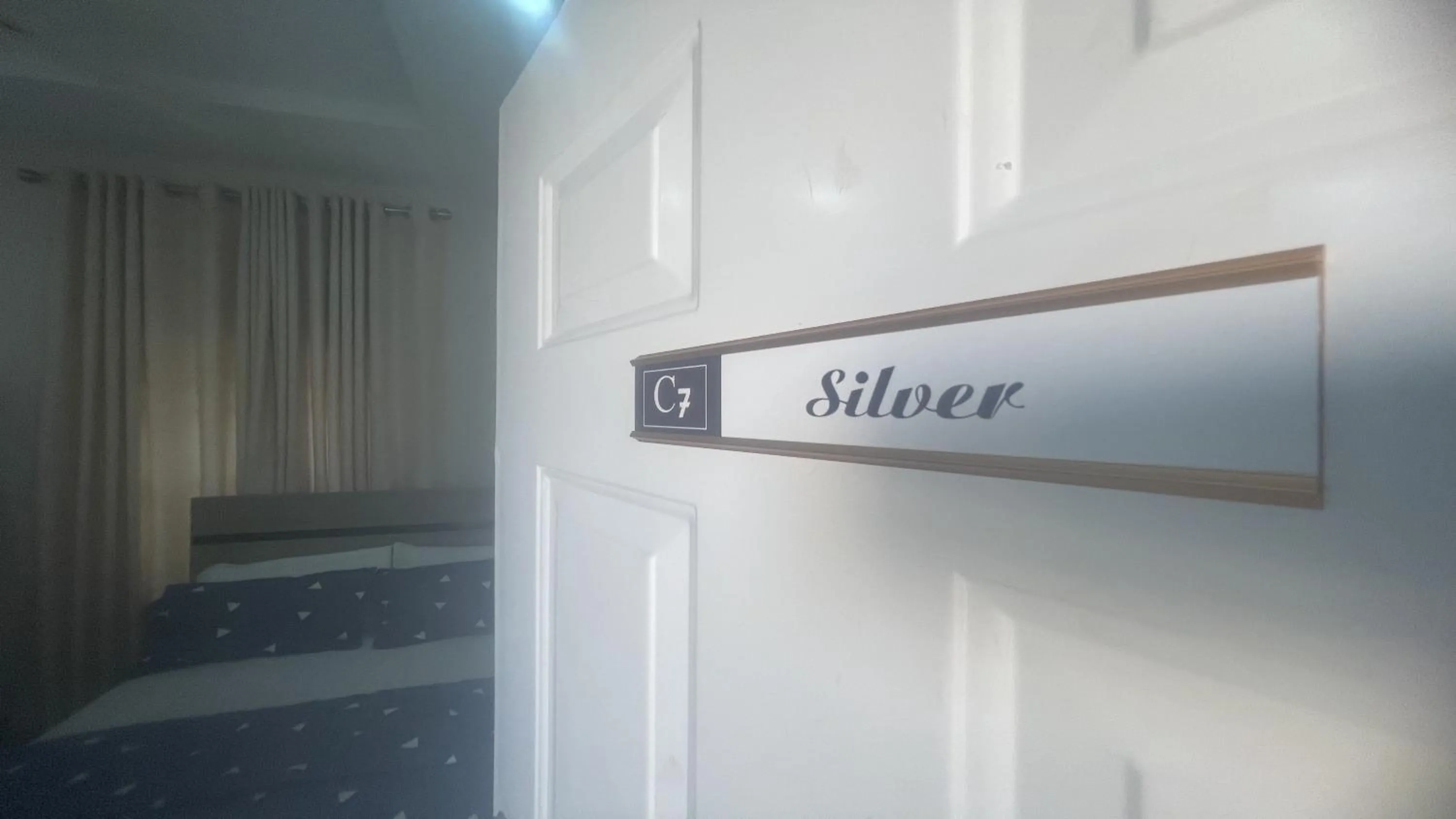 Property logo or sign in C7 Hazelwood Residence & Suites