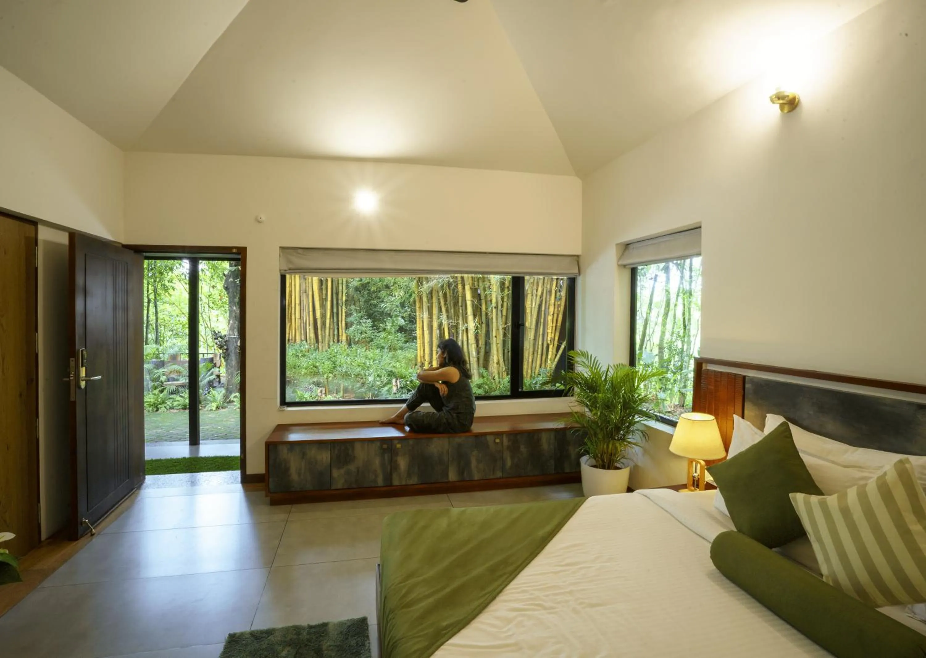 Bed in Crystal Kuruva Nature Resort & Spa