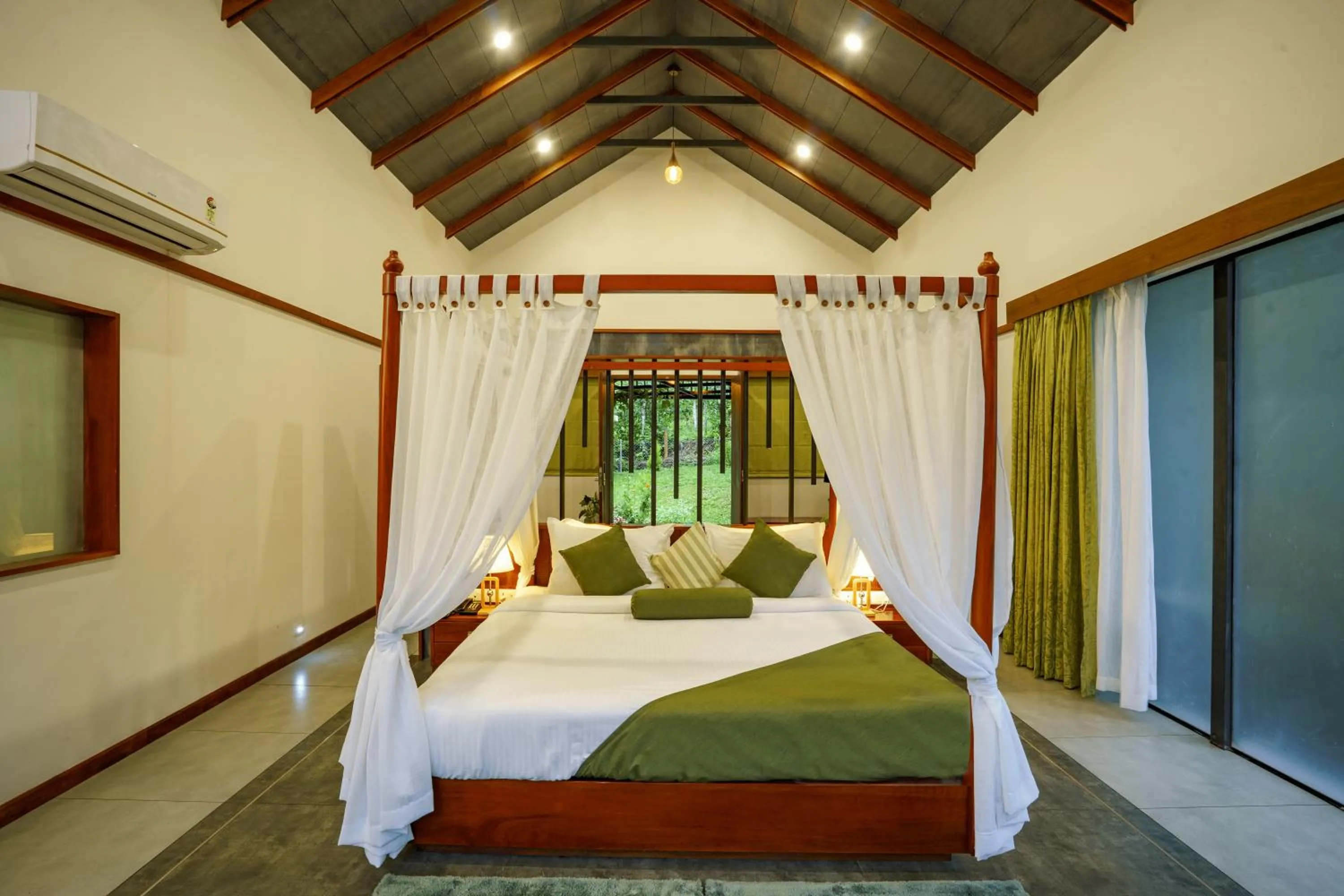 Bed in Crystal Kuruva Nature Resort & Spa