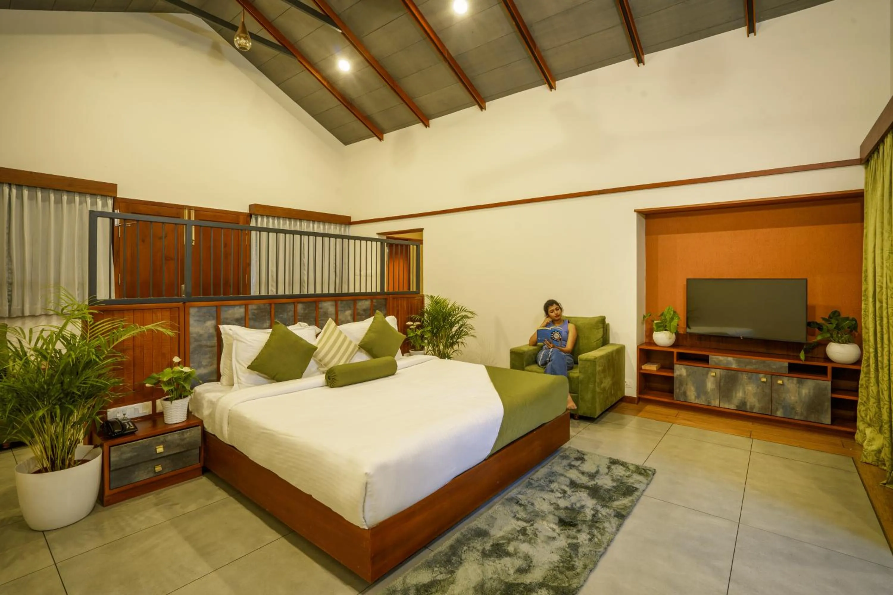 Bed in Crystal Kuruva Nature Resort & Spa