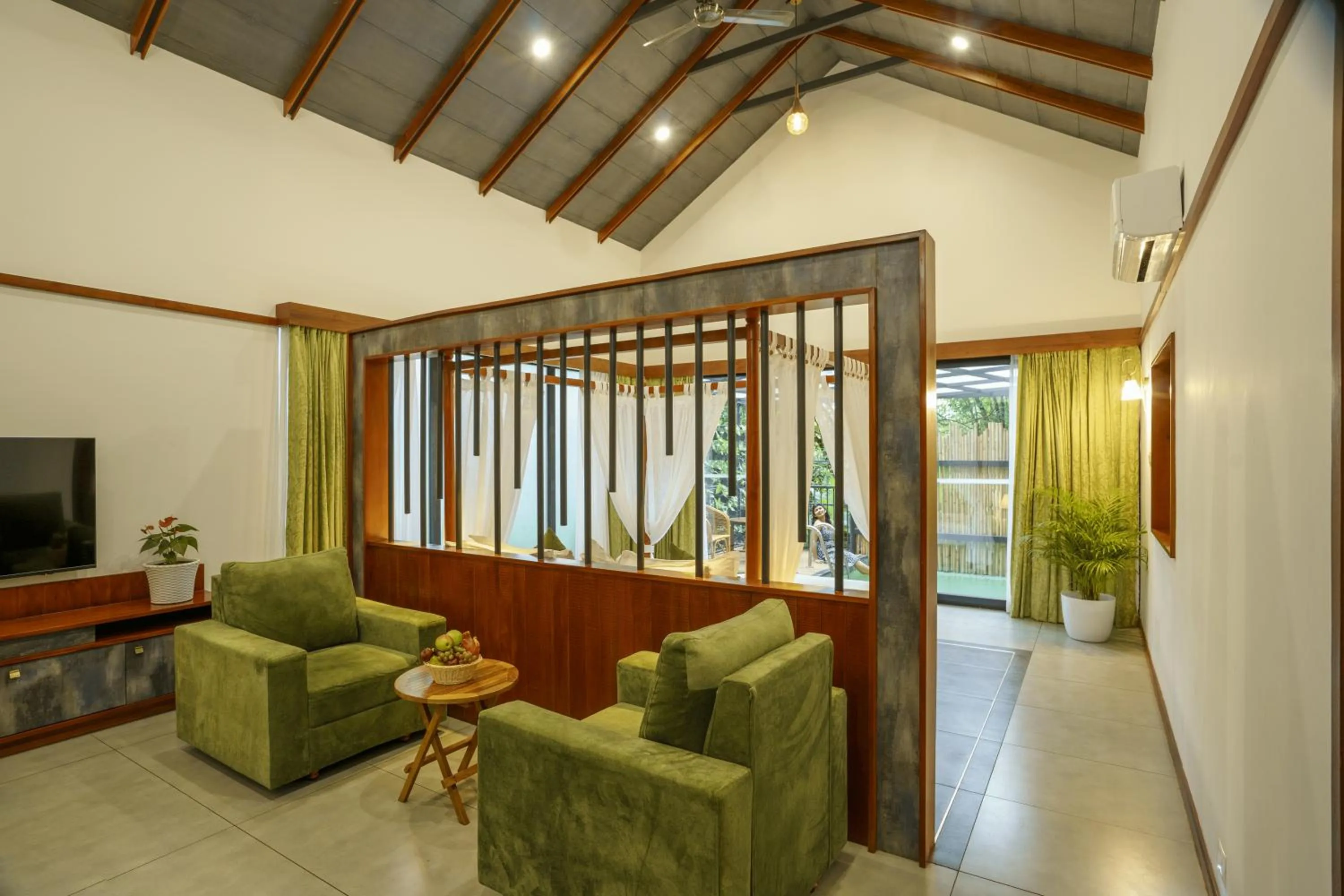 Bed in Crystal Kuruva Nature Resort & Spa