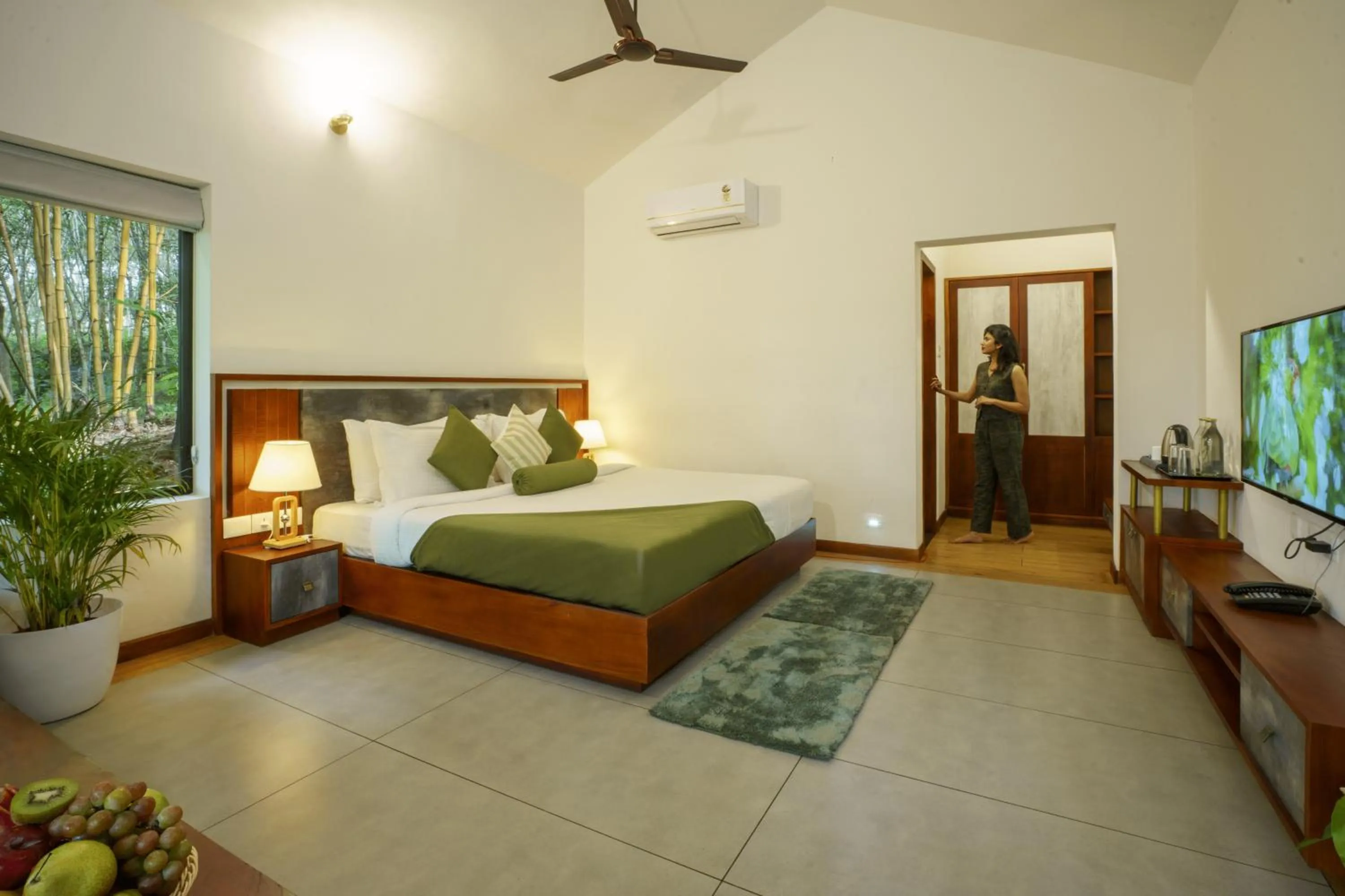 Bed in Crystal Kuruva Nature Resort & Spa