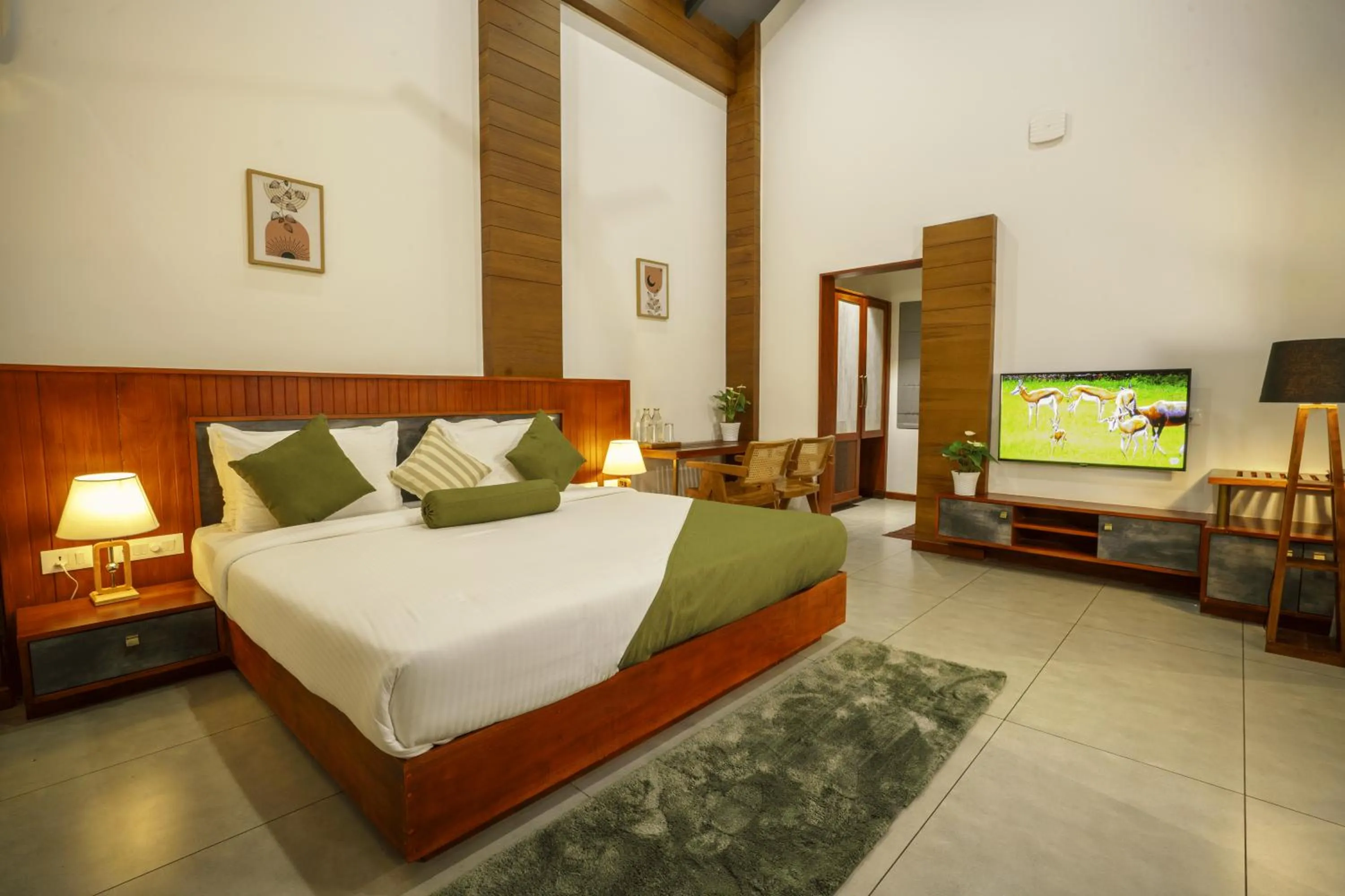 Bed in Crystal Kuruva Nature Resort & Spa