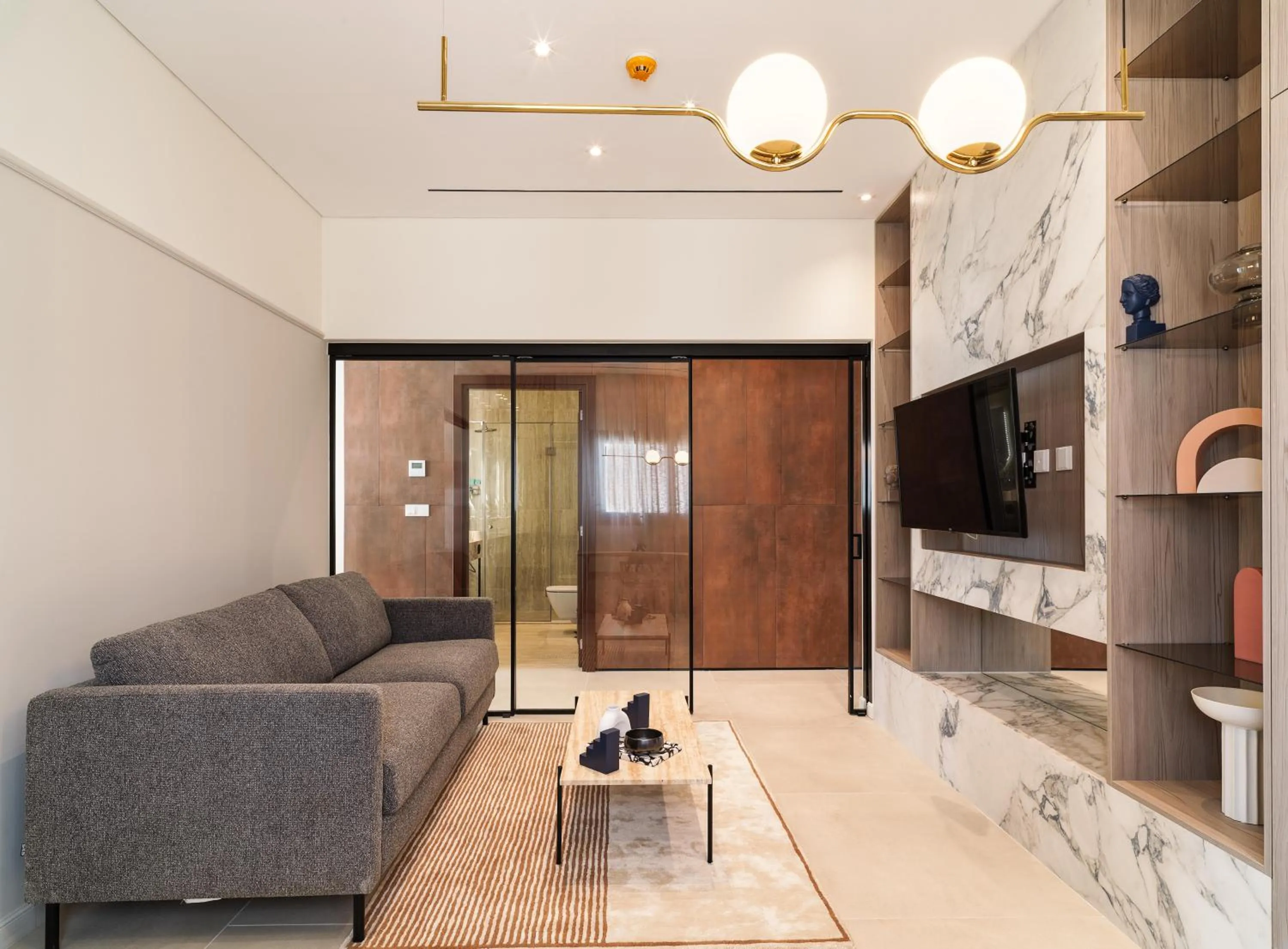 TV and multimedia in LIV Mackenzie Beach Suites Larnaca ADULTS ONLY