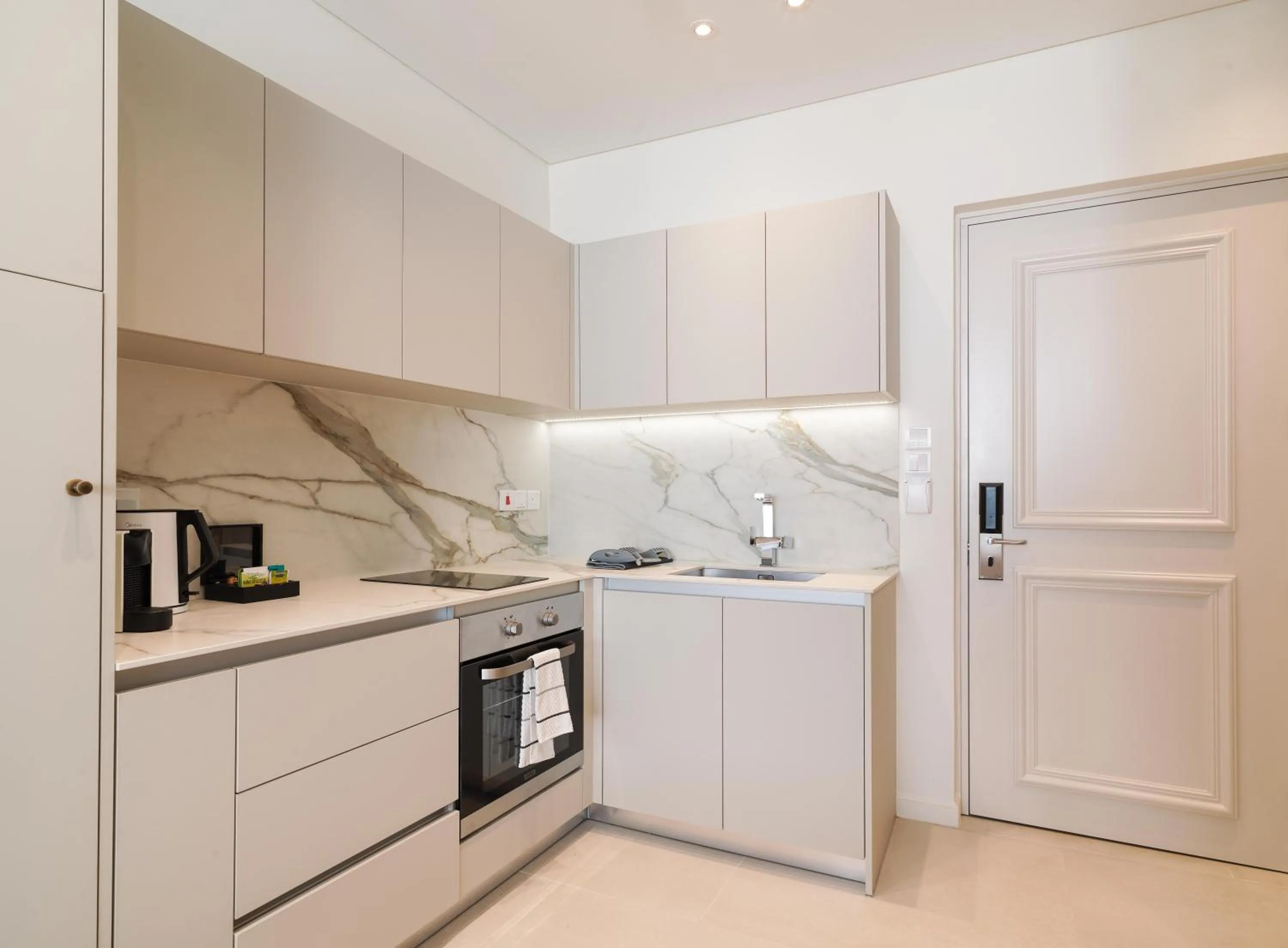 kitchen in LIV Mackenzie Beach Suites Larnaca ADULTS ONLY