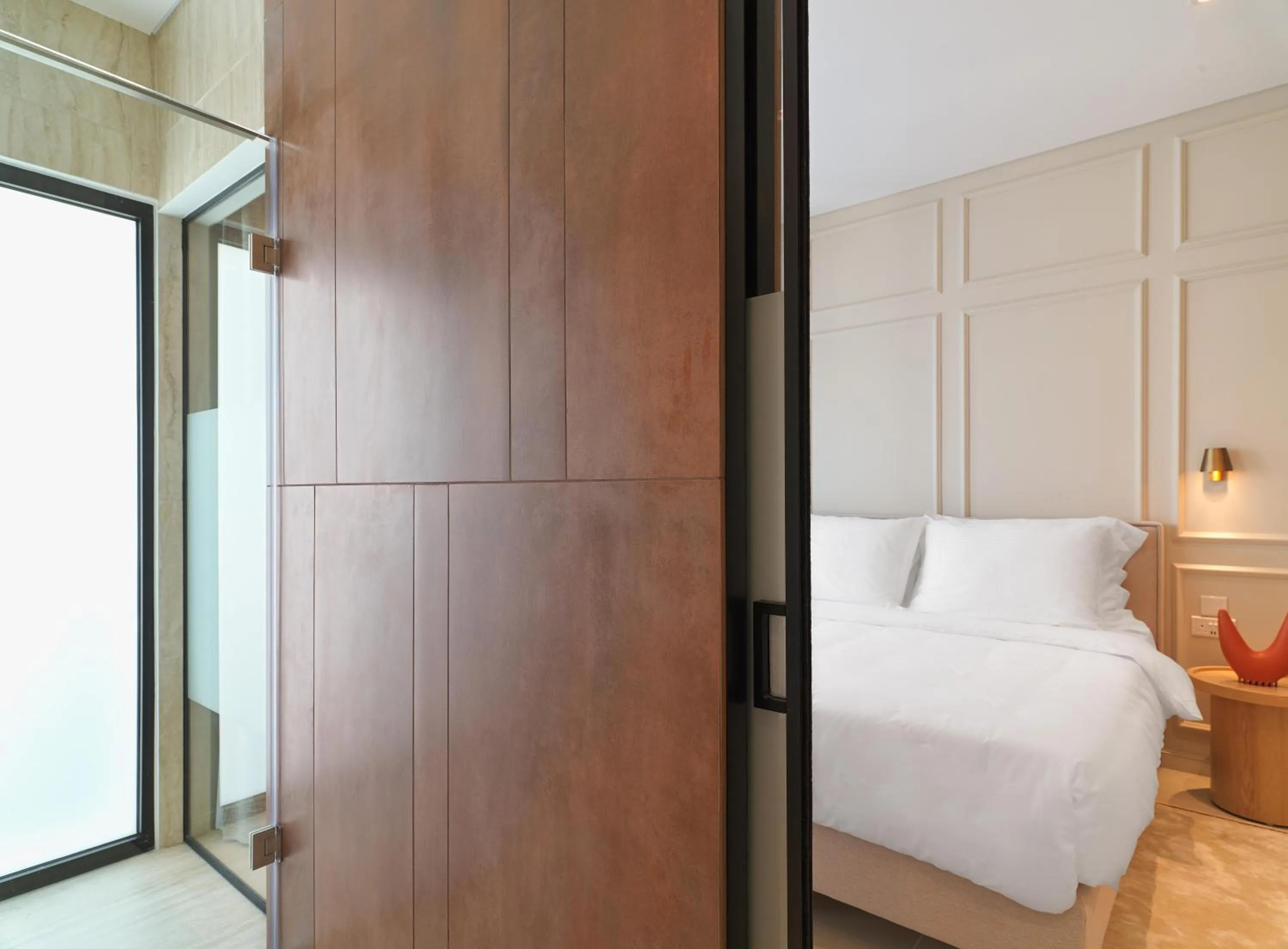 Bathroom, Bed in LIV Mackenzie Beach Suites Larnaca ADULTS ONLY