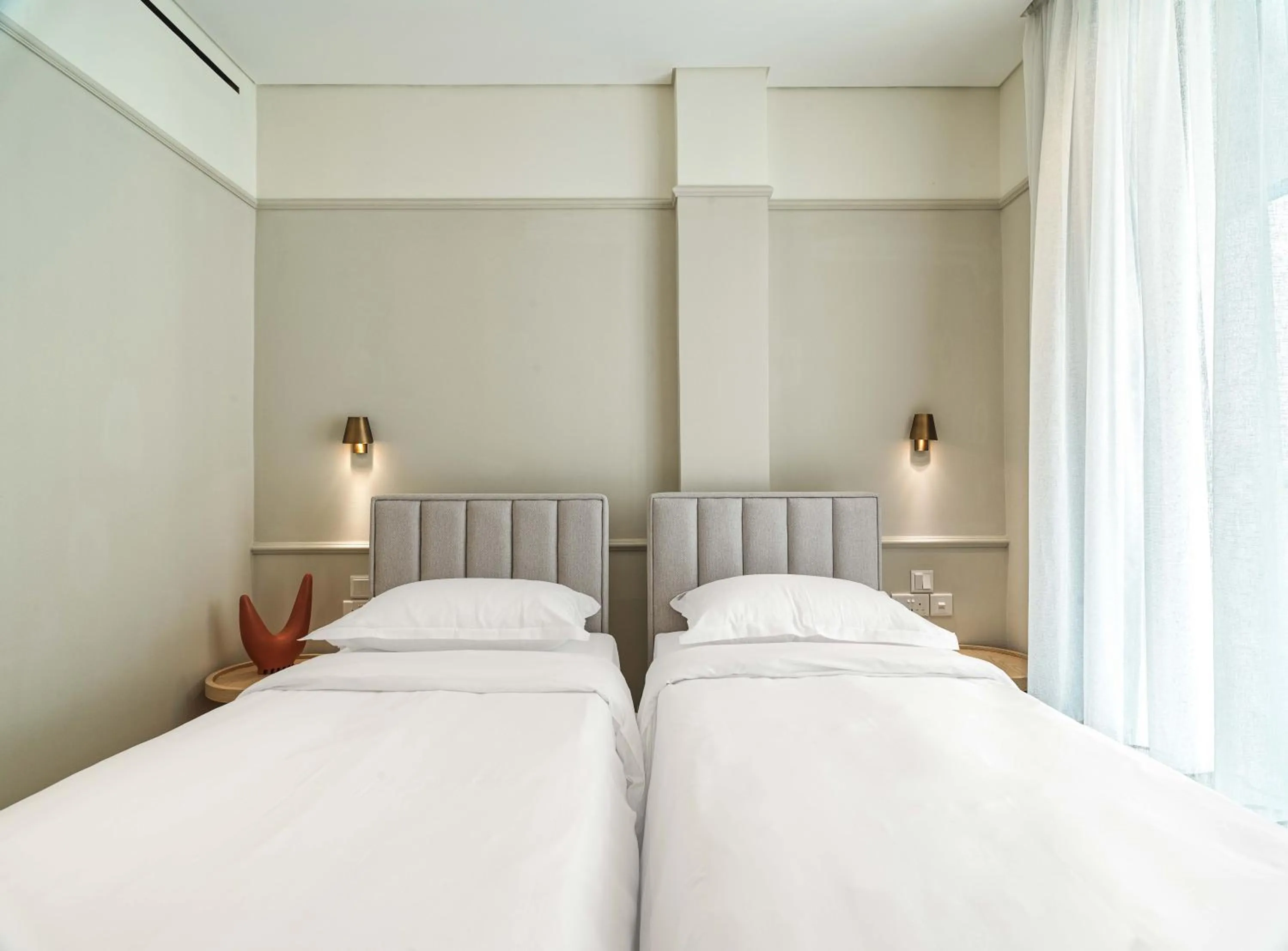 Bed in LIV Mackenzie Beach Suites Larnaca ADULTS ONLY