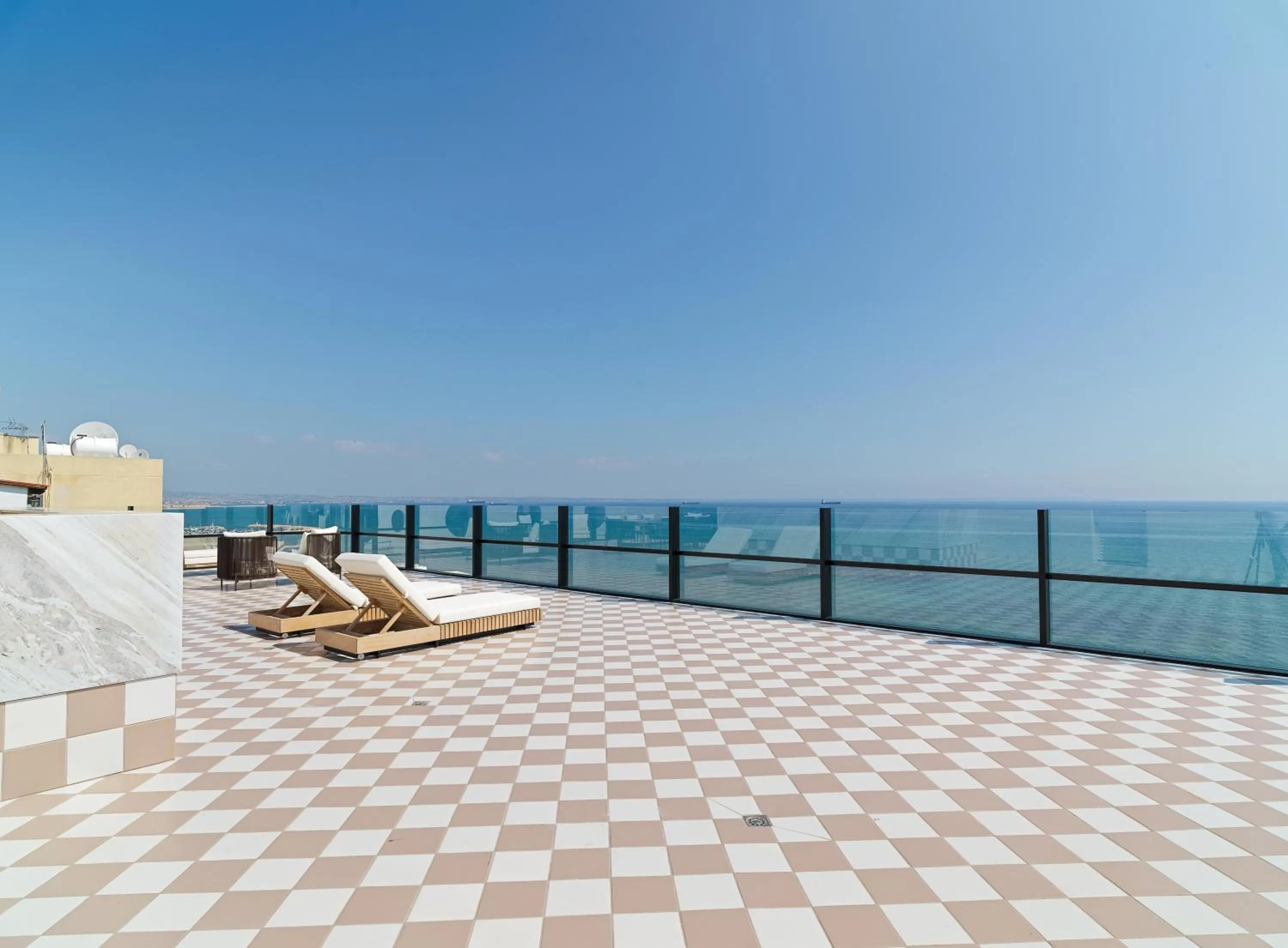 Patio in LIV Mackenzie Beach Suites Larnaca ADULTS ONLY