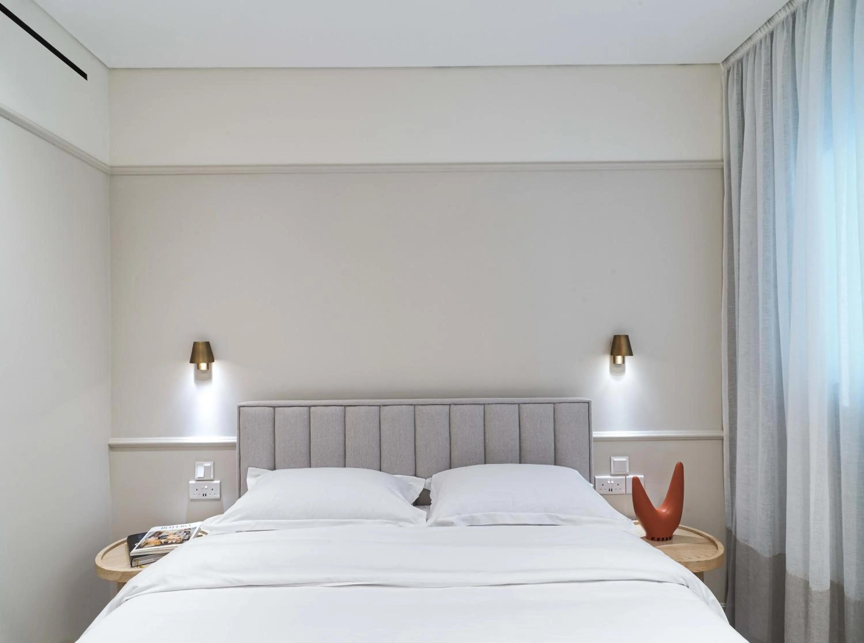 Bed in LIV Mackenzie Beach Suites Larnaca ADULTS ONLY