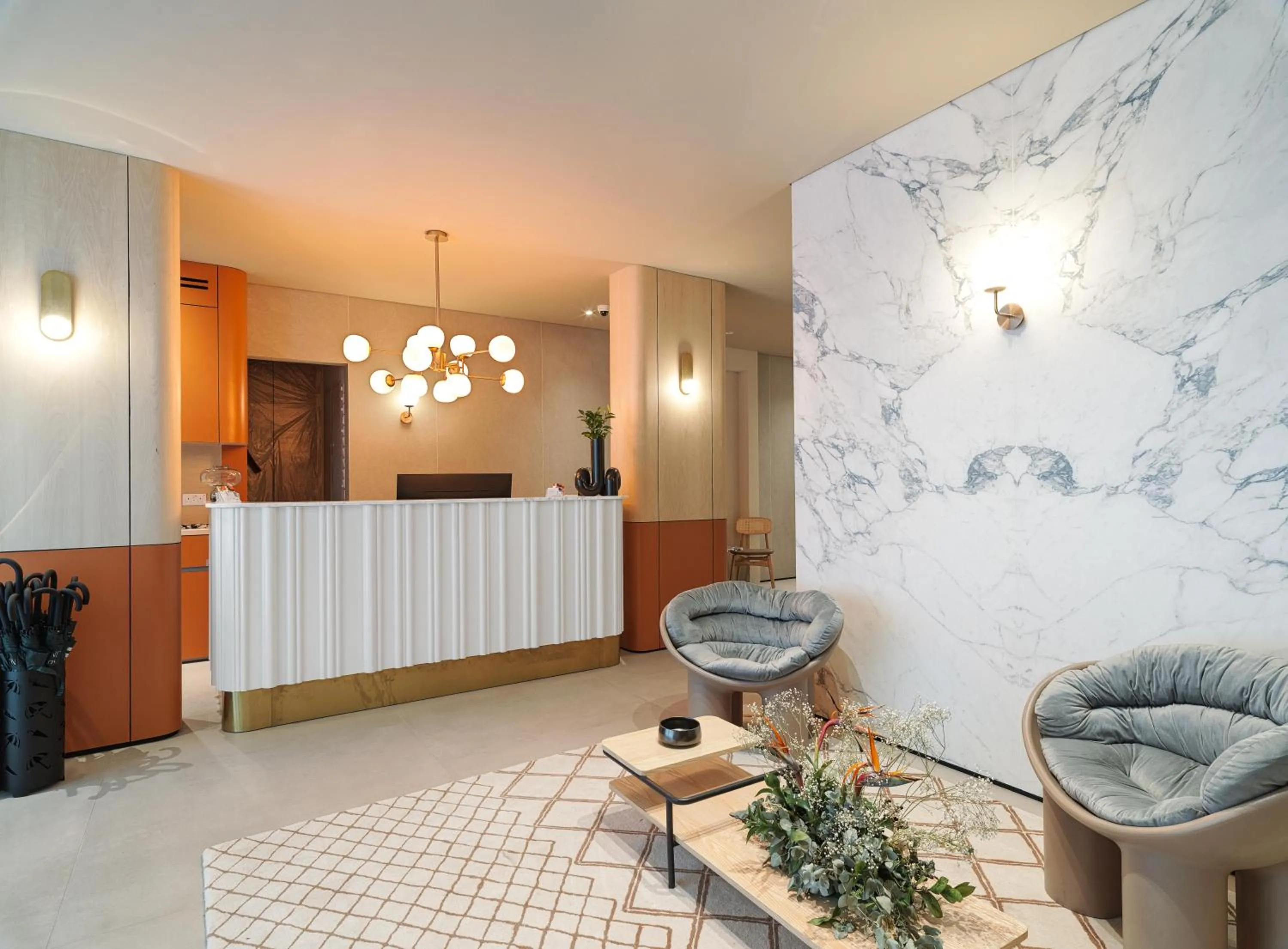 Lobby or reception in LIV Mackenzie Beach Suites Larnaca ADULTS ONLY