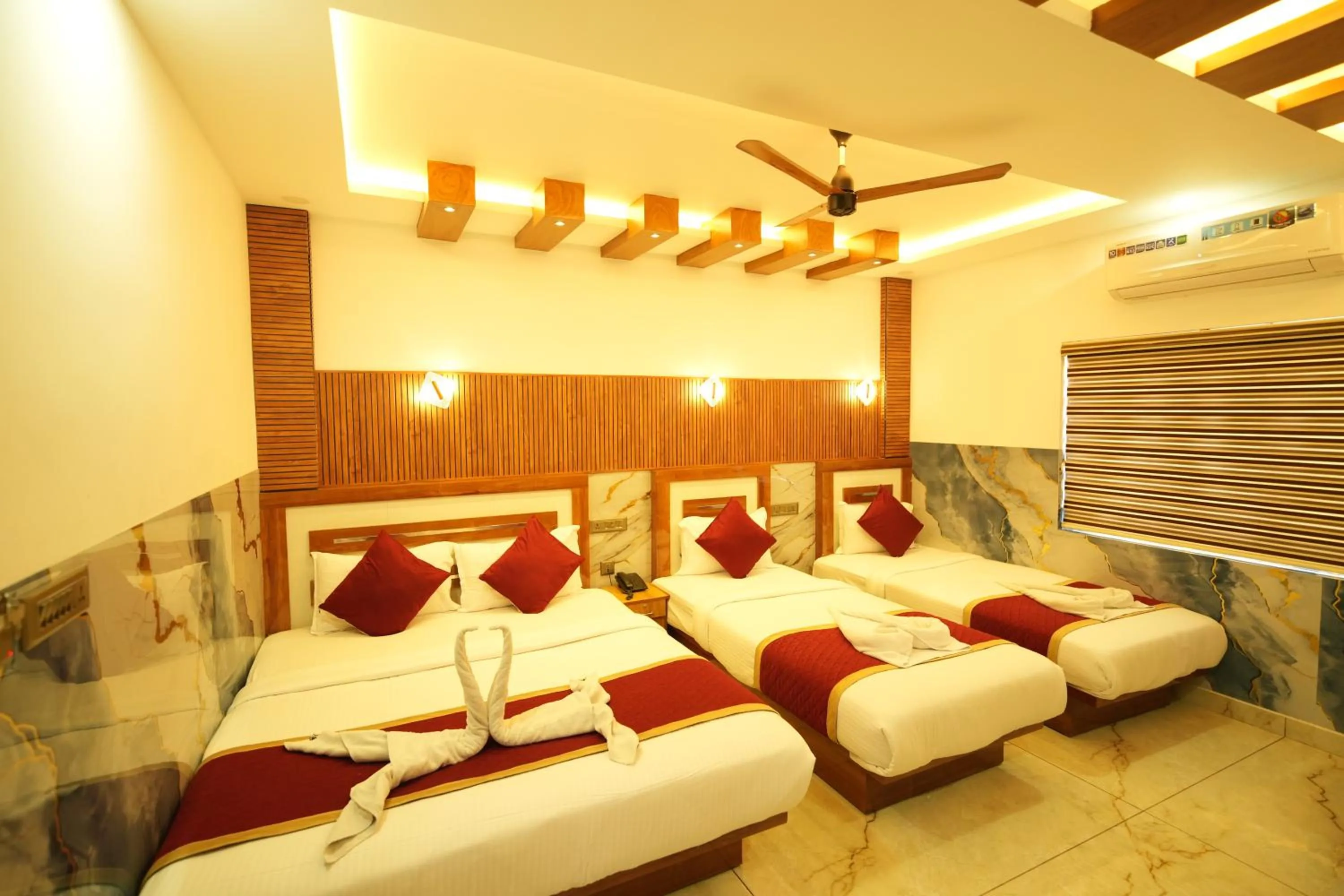 Bed in MARINA SUITES AIRPORT HOTEL