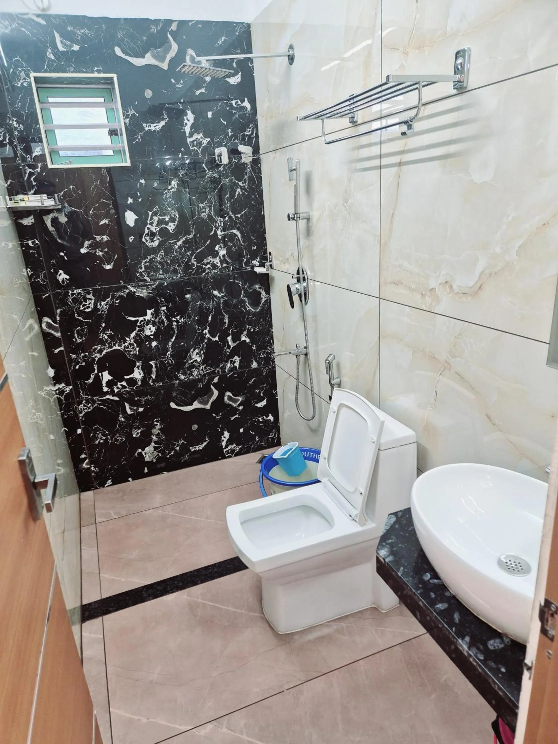 Toilet in MARINA SUITES AIRPORT HOTEL