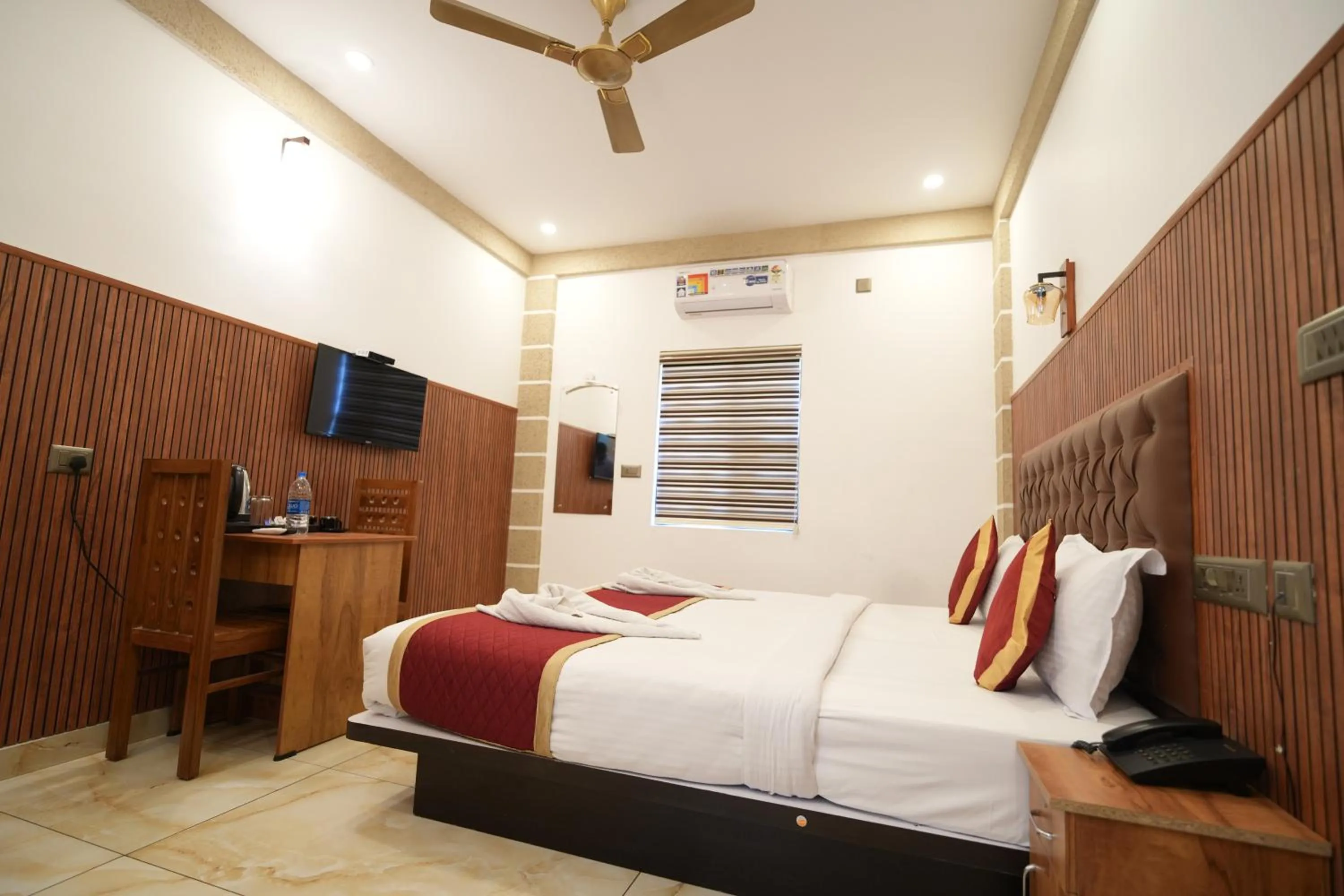 Bed in MARINA SUITES AIRPORT HOTEL