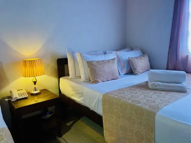 Bed in Muduna Walawwa Resort