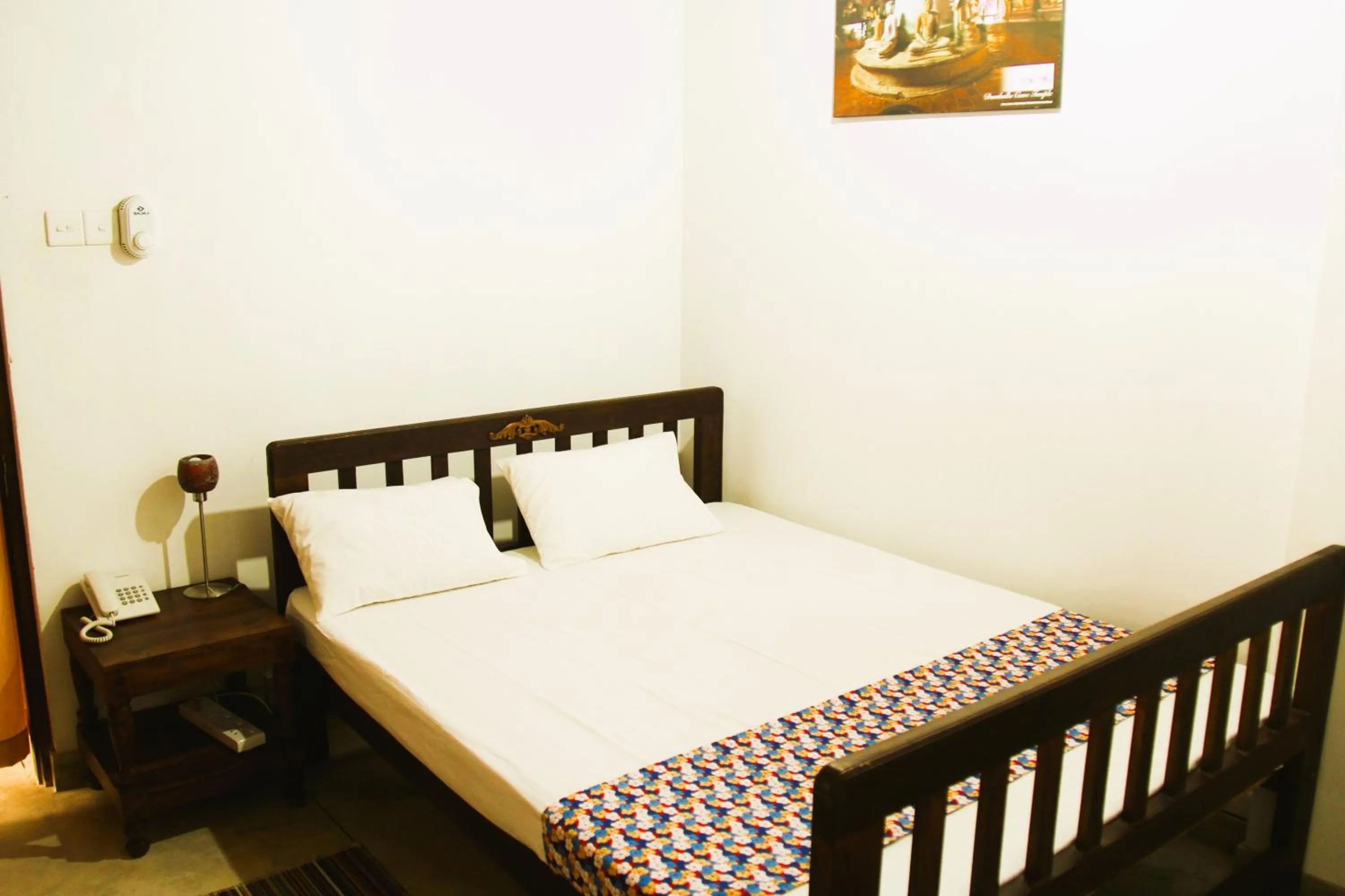 Bed in Muduna Walawwa Resort