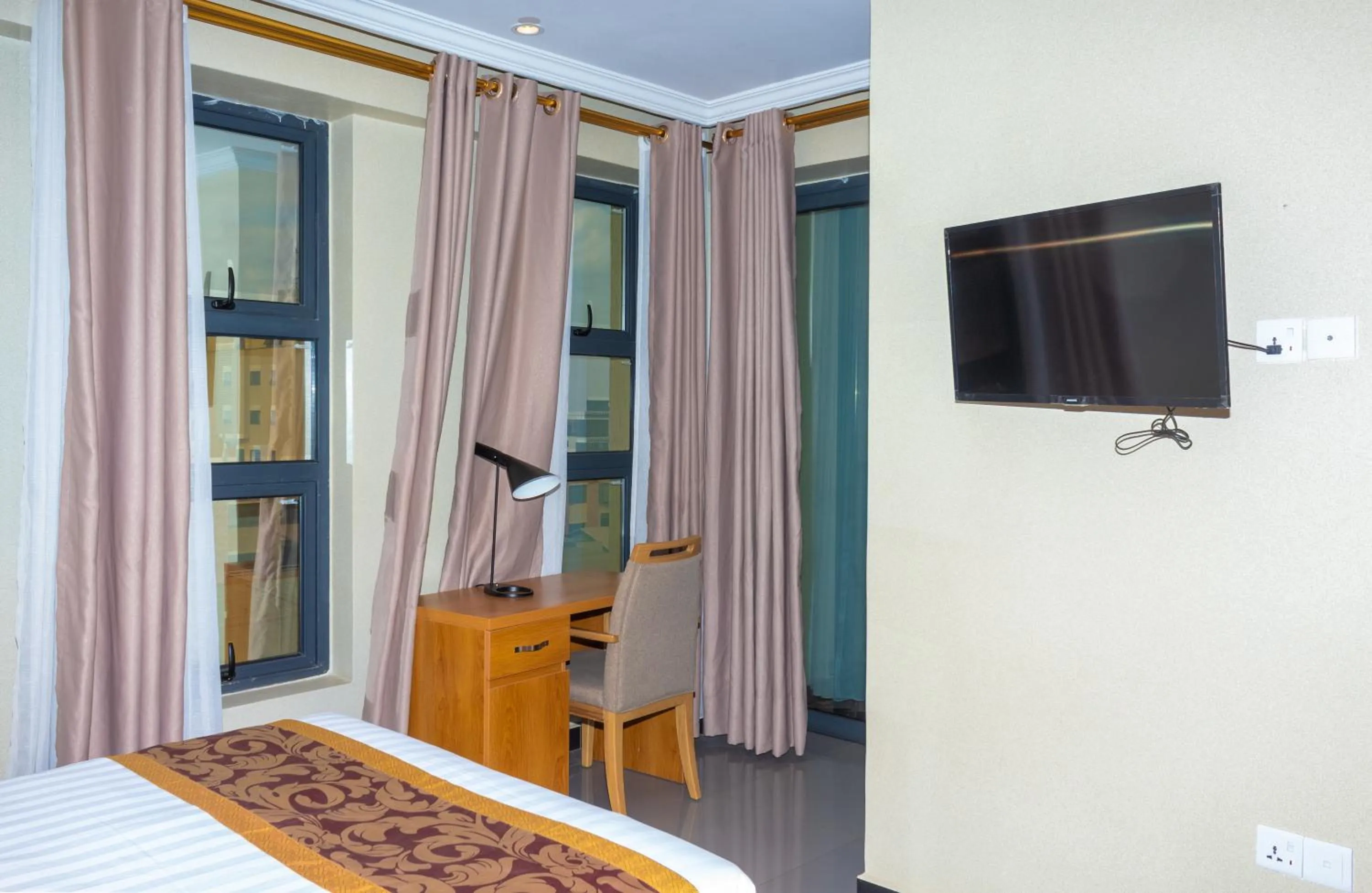 Bedroom in Tropical Plaza Apartments