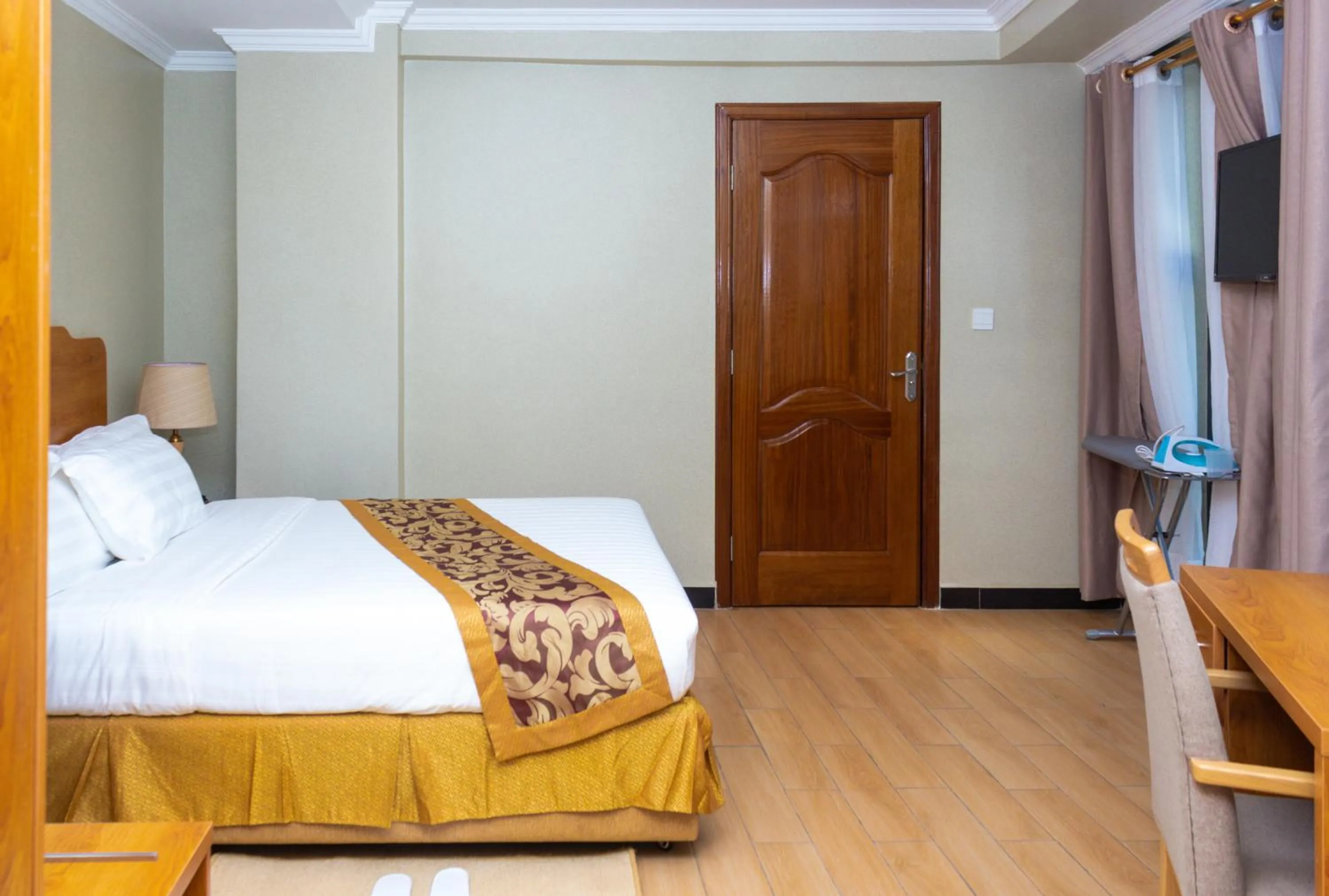 Bedroom in Tropical Plaza Apartments