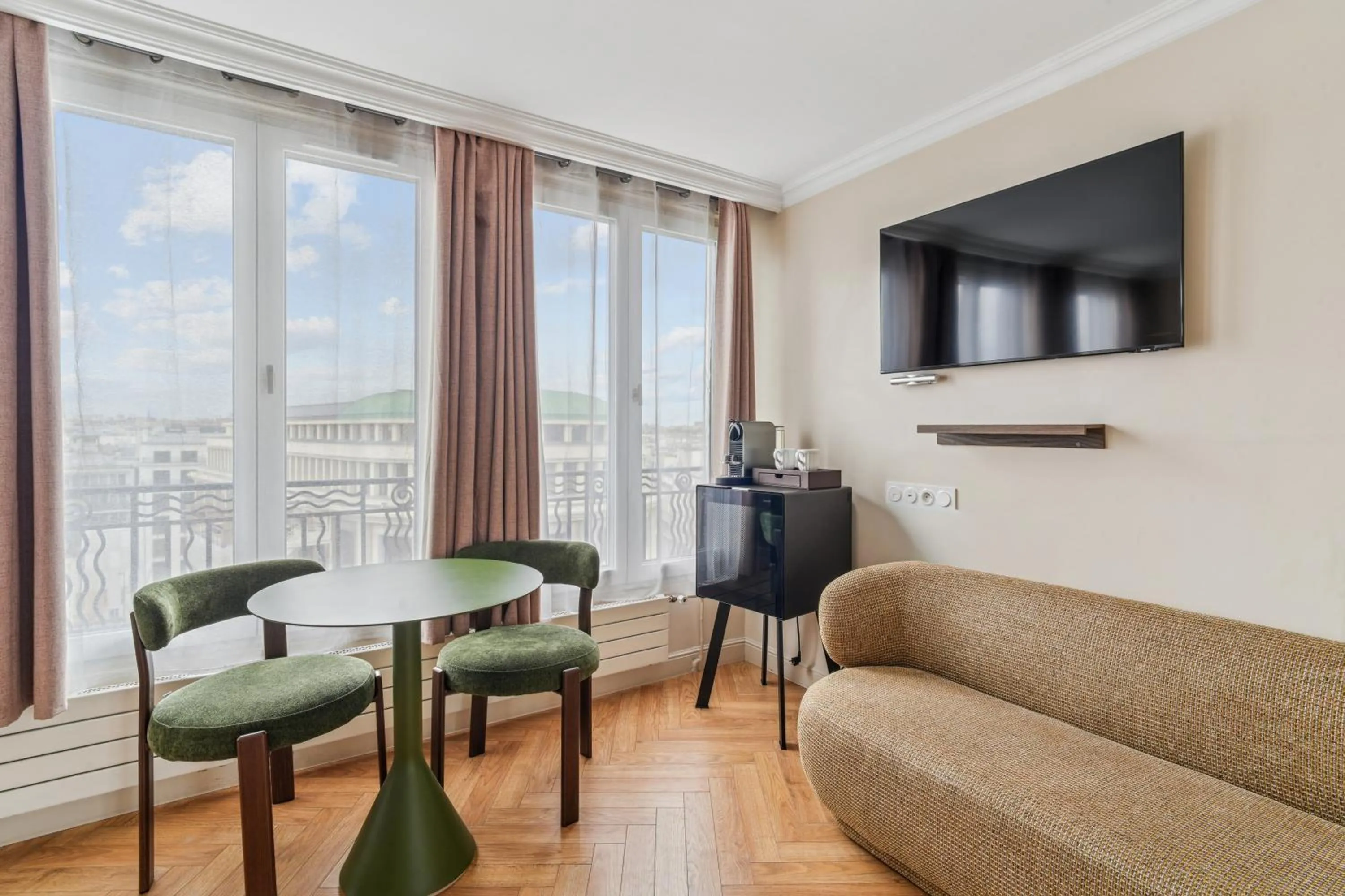 Communal lounge/ TV room in Hotel Le Clery