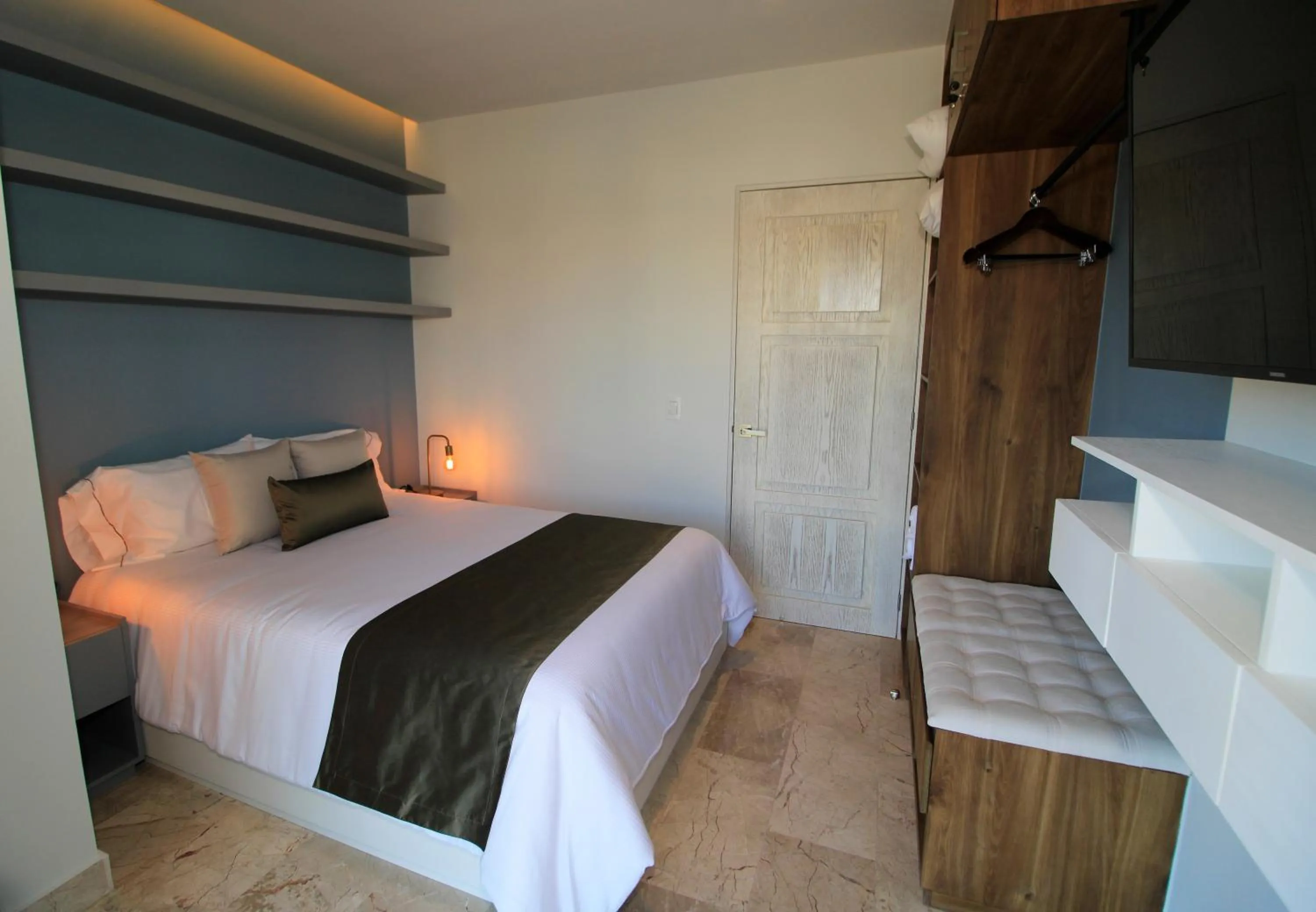 Bed in Singular Dream Vacation Rentals